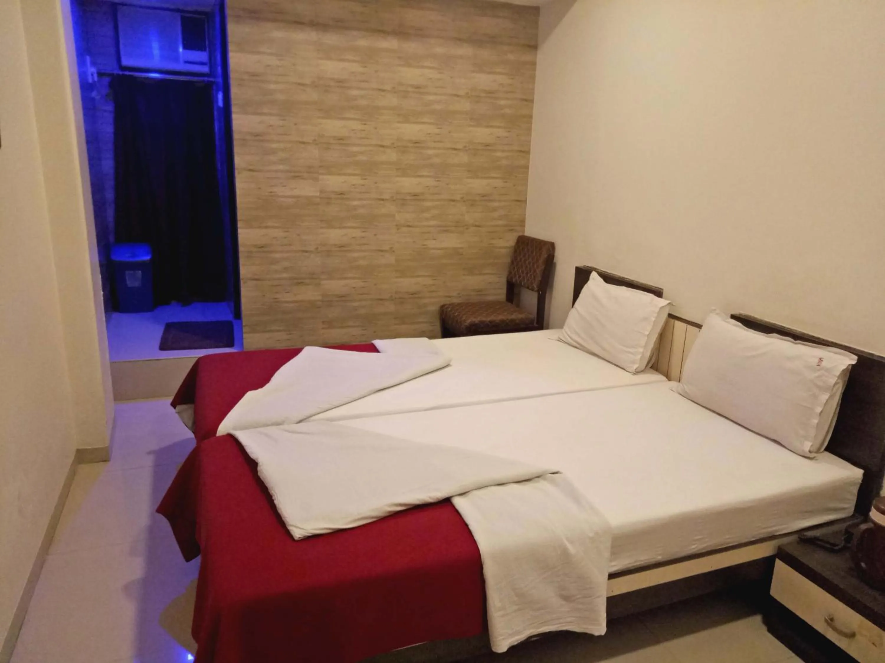 Bed in Hotel Navi Mumbai
