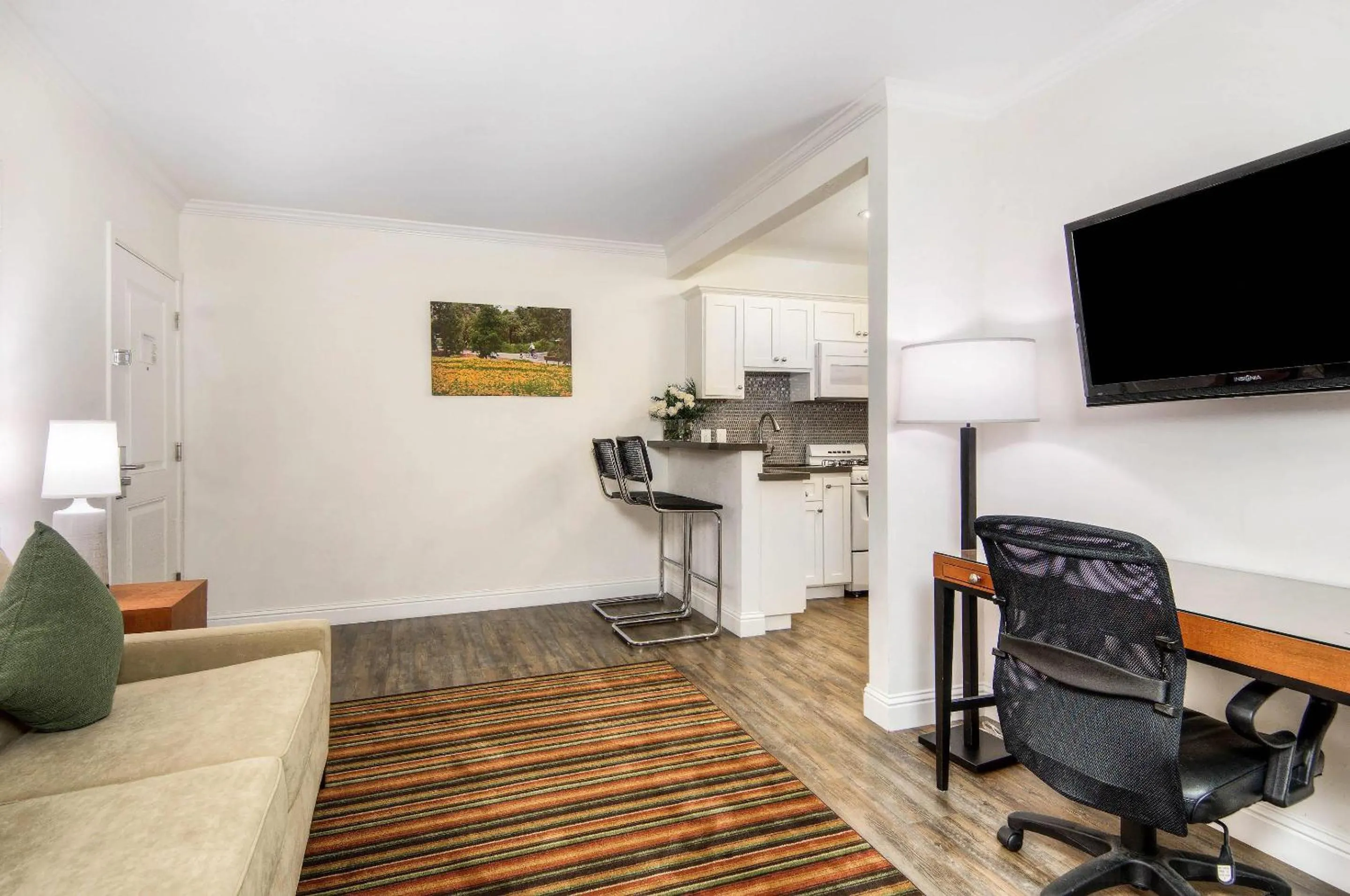 Bedroom in Aggie Inn, an Ascend Collection Hotel