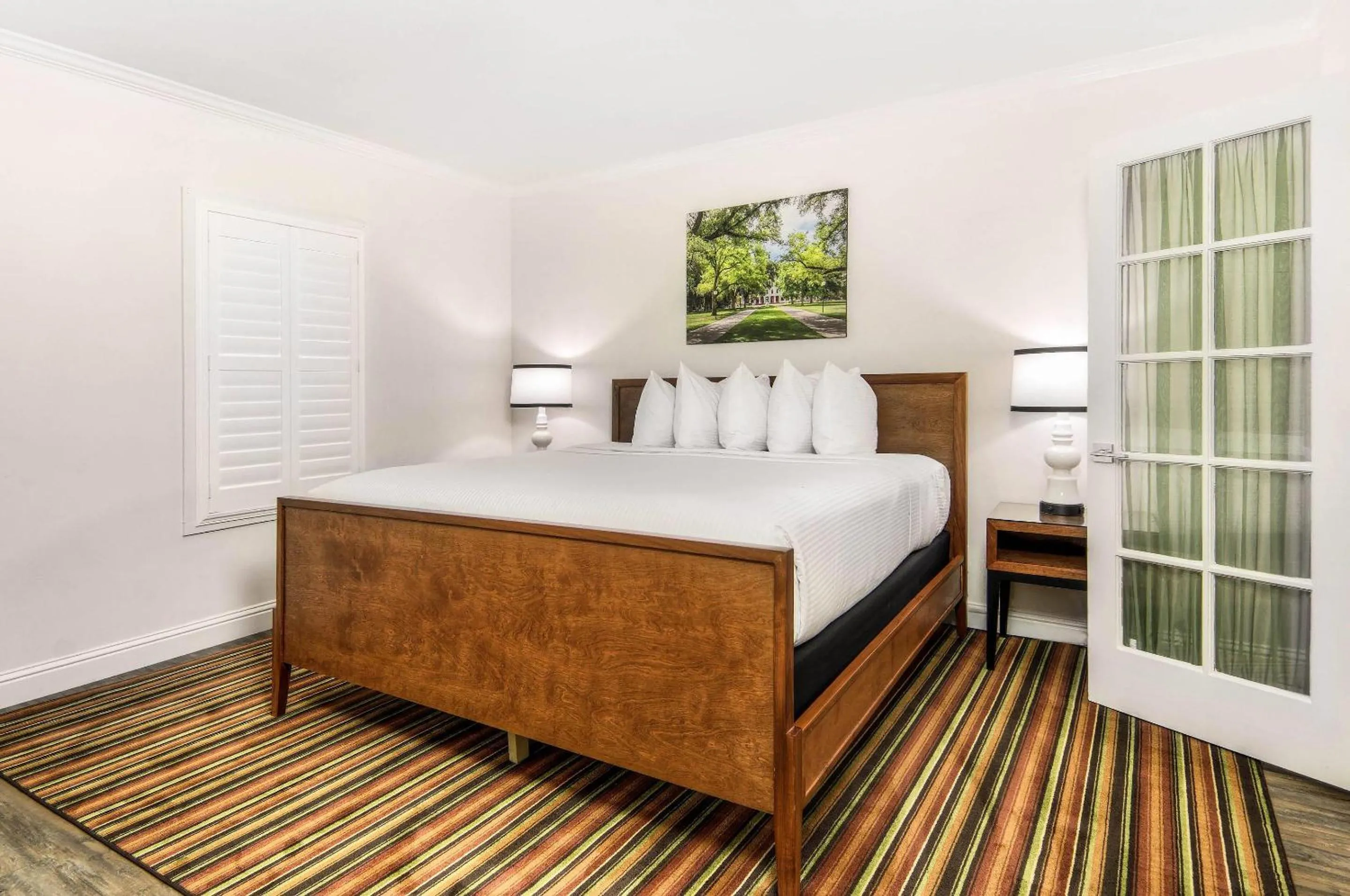 Bedroom, Bed in Aggie Inn, an Ascend Collection Hotel