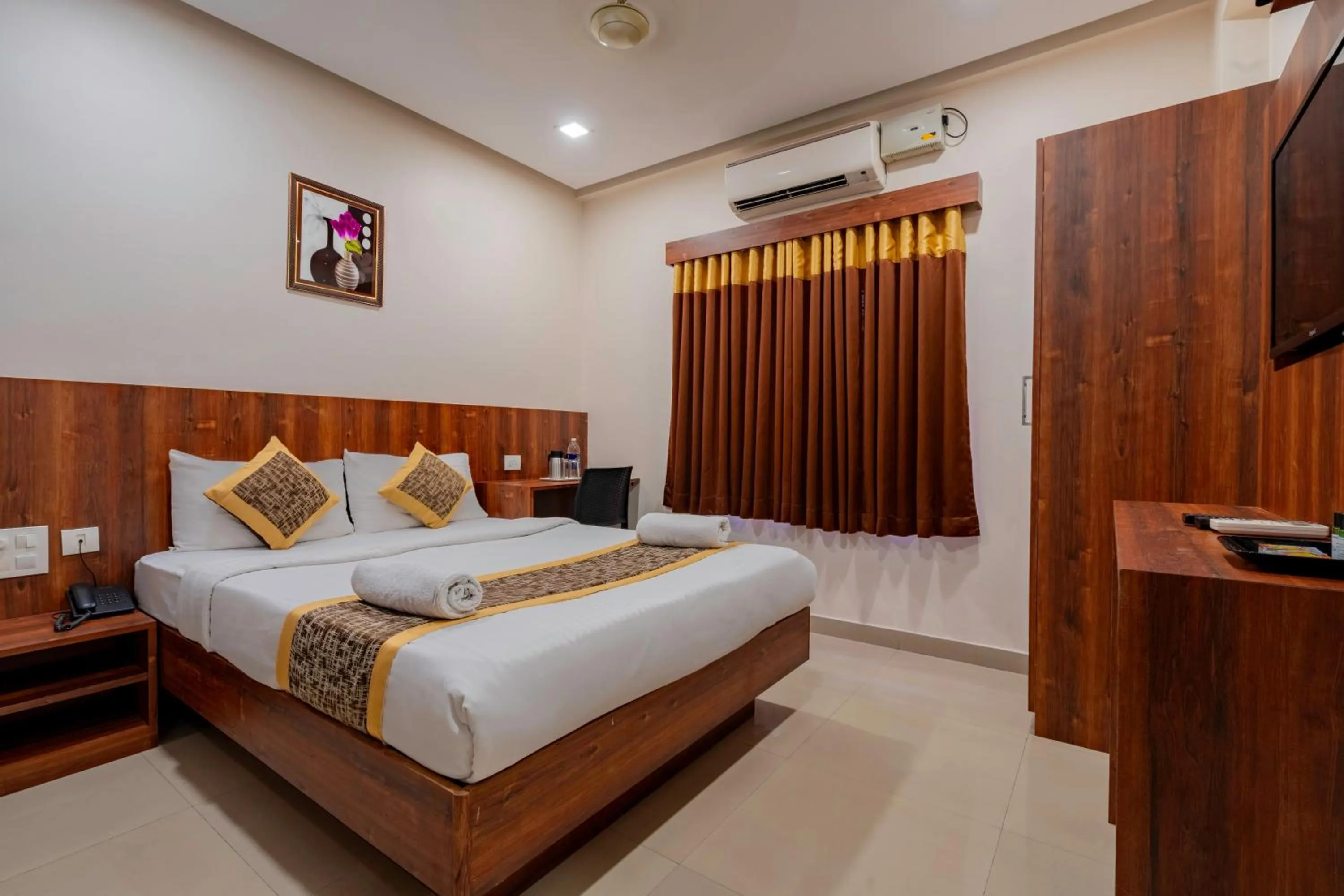 Bed in Prime Palace Hotel - MG Road