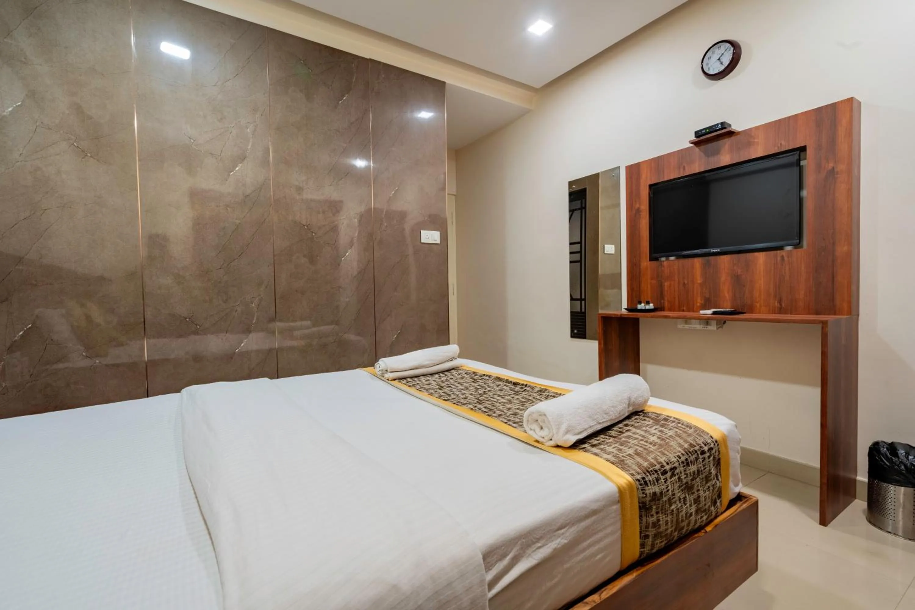 Bed in Prime Palace Hotel - MG Road