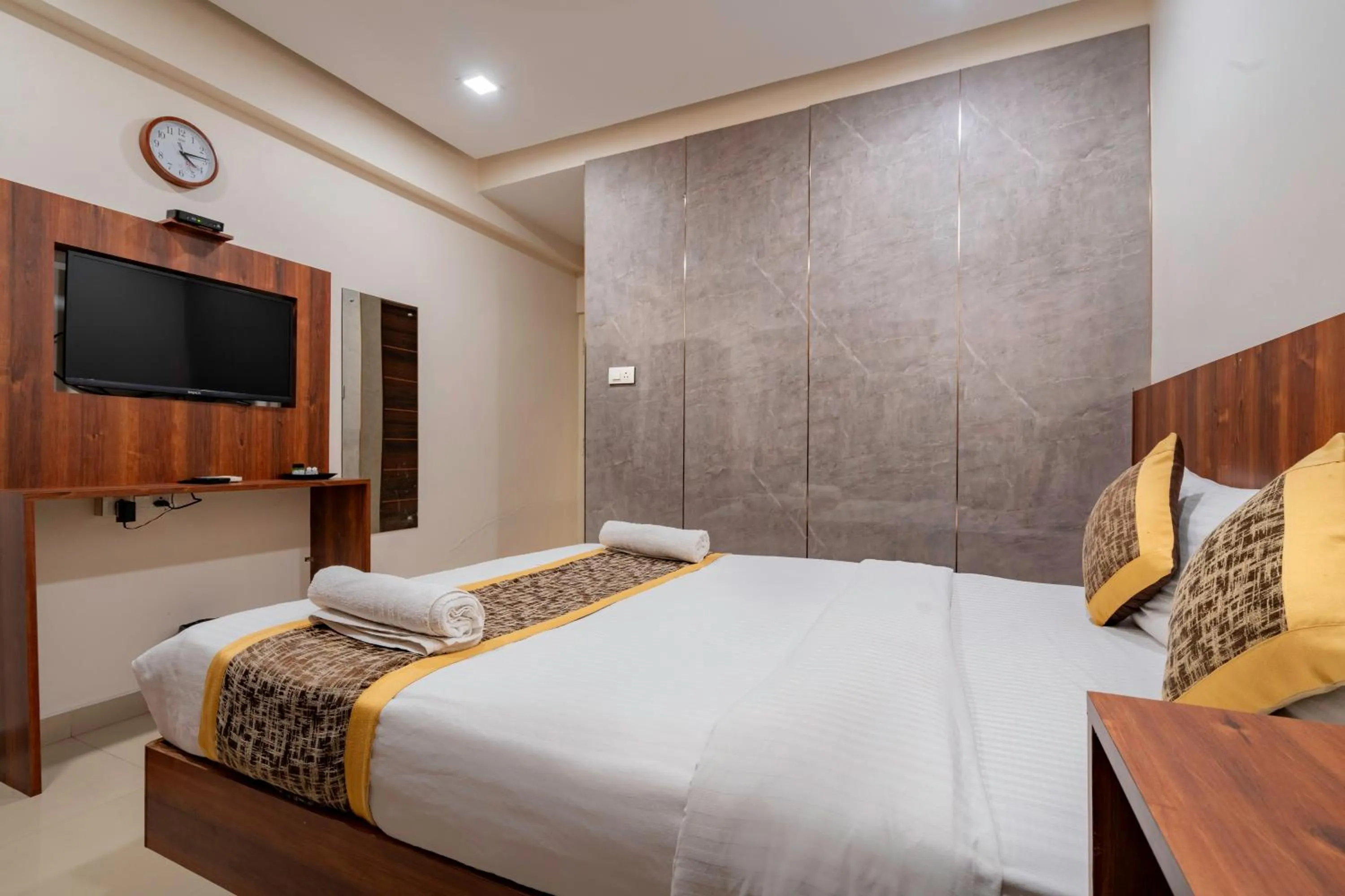 Bed in Prime Palace Hotel - MG Road