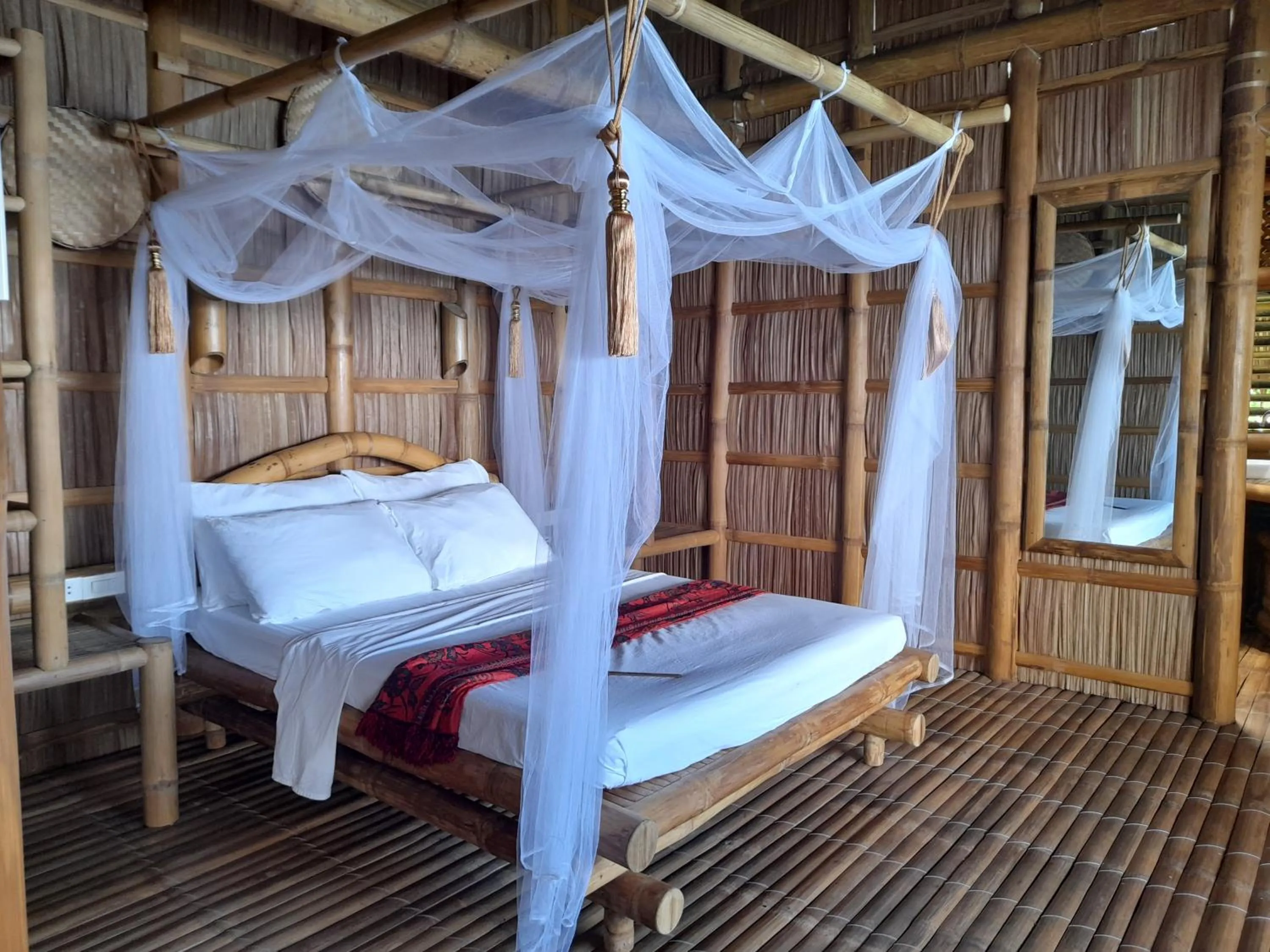 Bed in Kookoo's nest eco-lodge