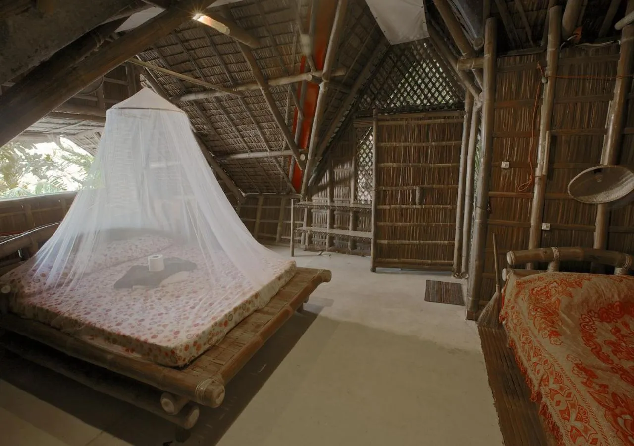 Bed in Kookoo's nest eco-lodge