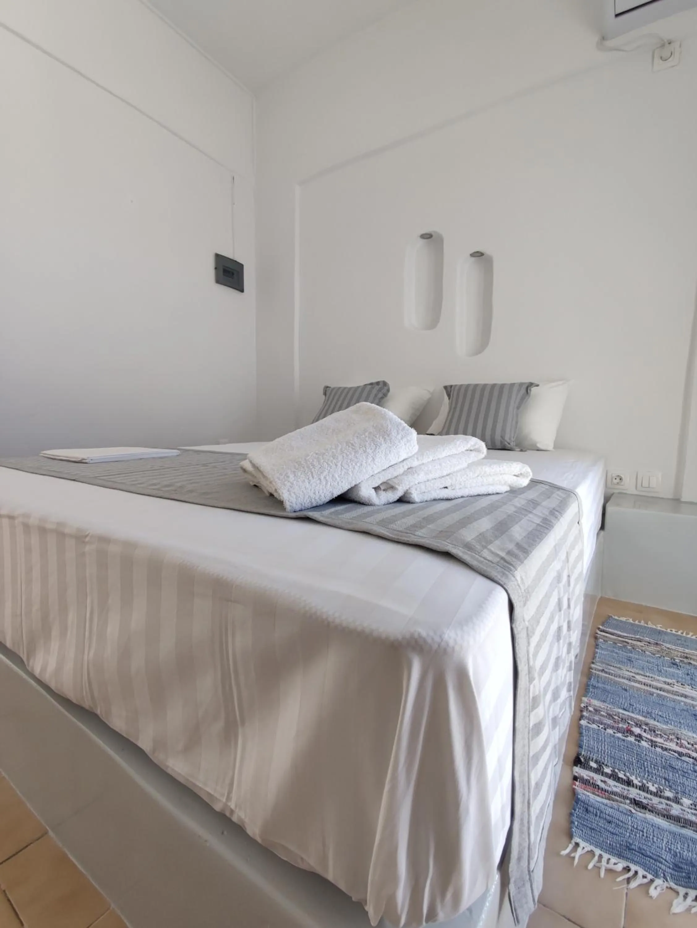 Bed in Agnanti Hotel