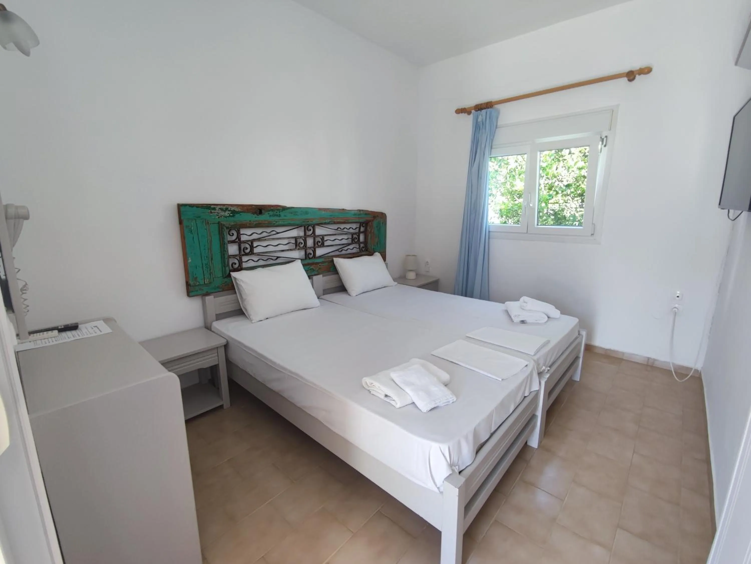 Bed in Agnanti Hotel