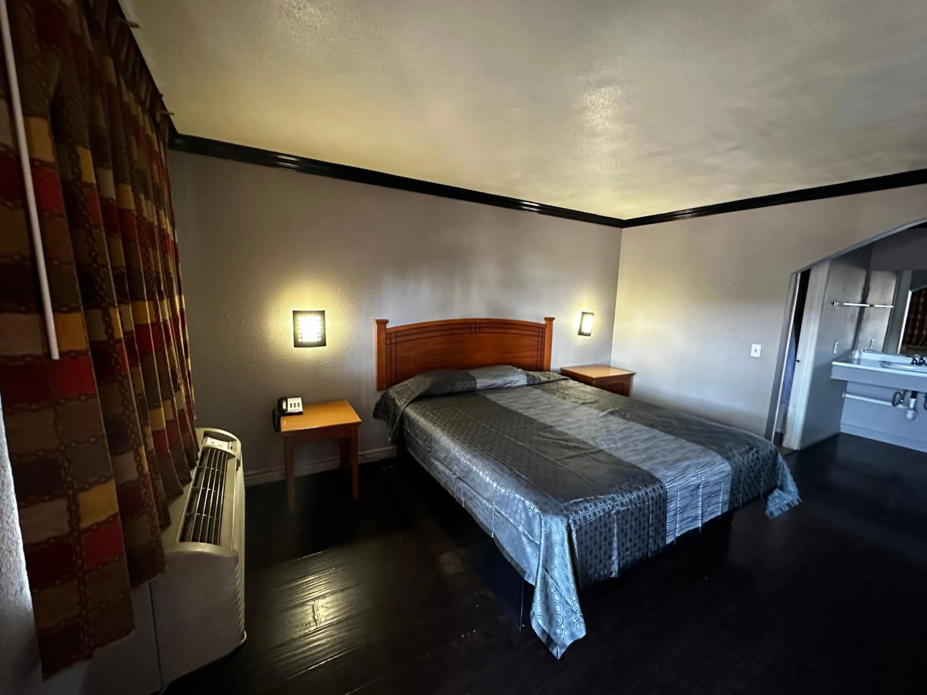 Bedroom, Bed in Sunpark Inn & Suites