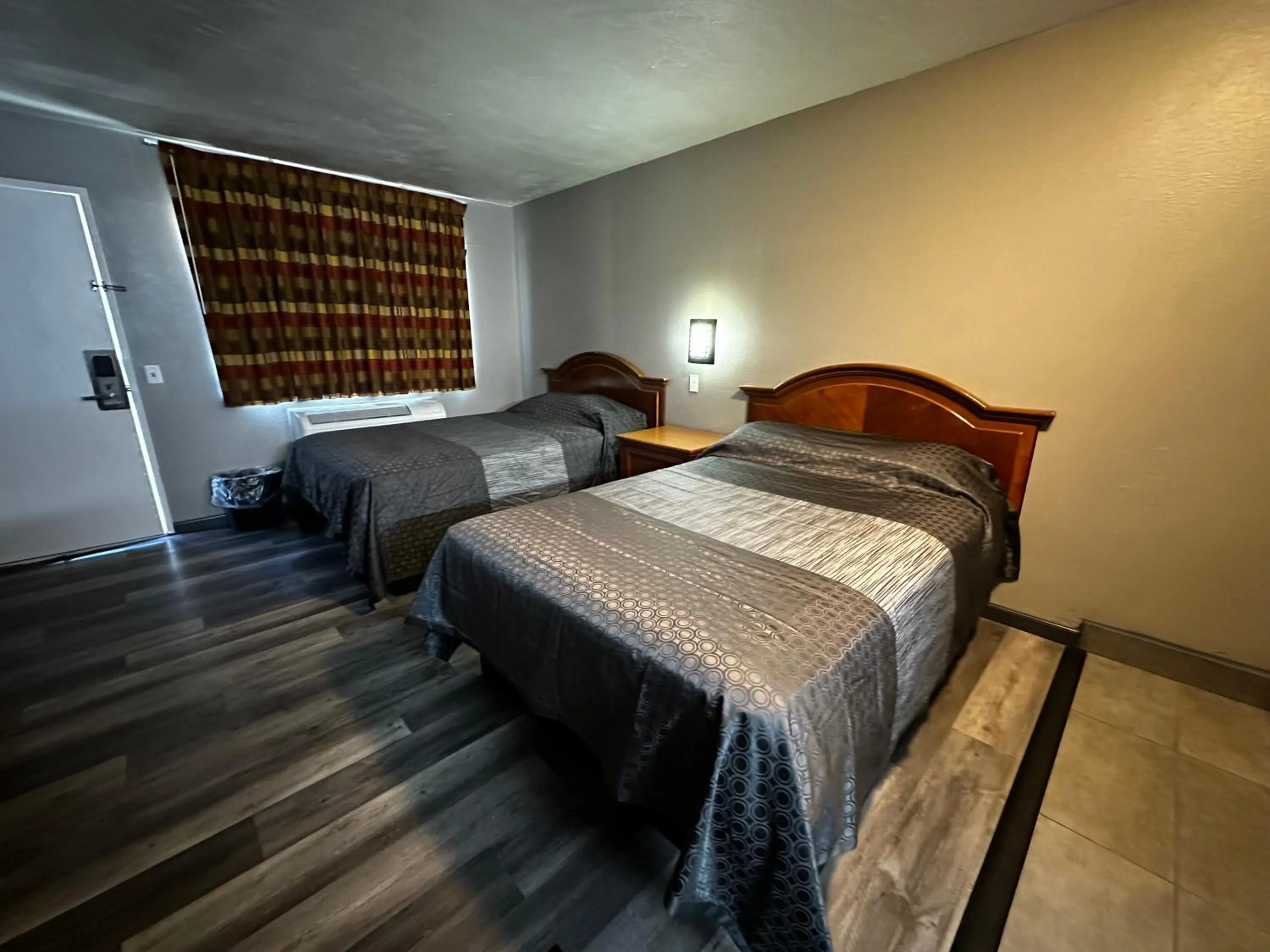 Bedroom, Bed in Sunpark Inn & Suites