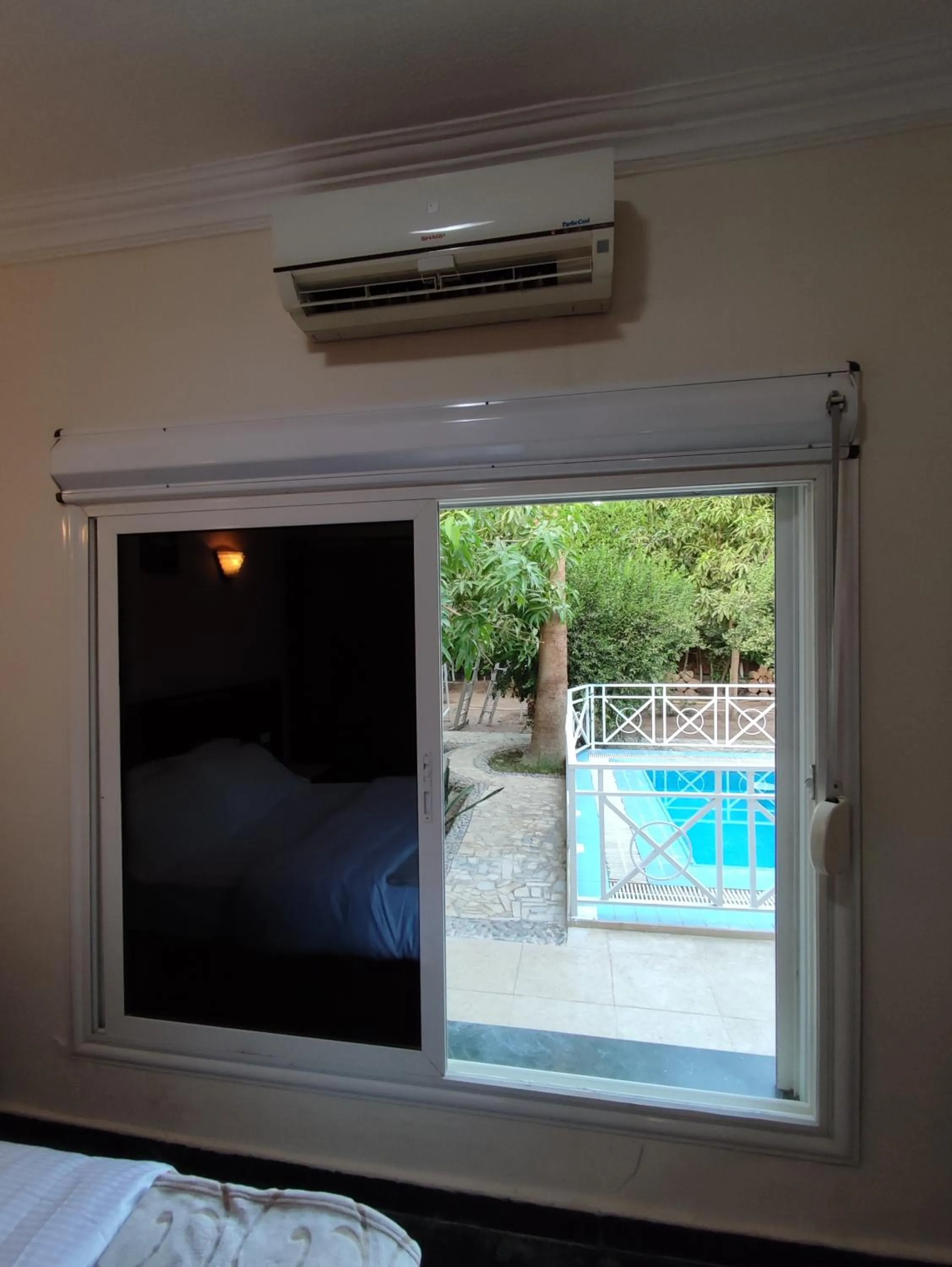 Pool view, Bed in Villa Rayan