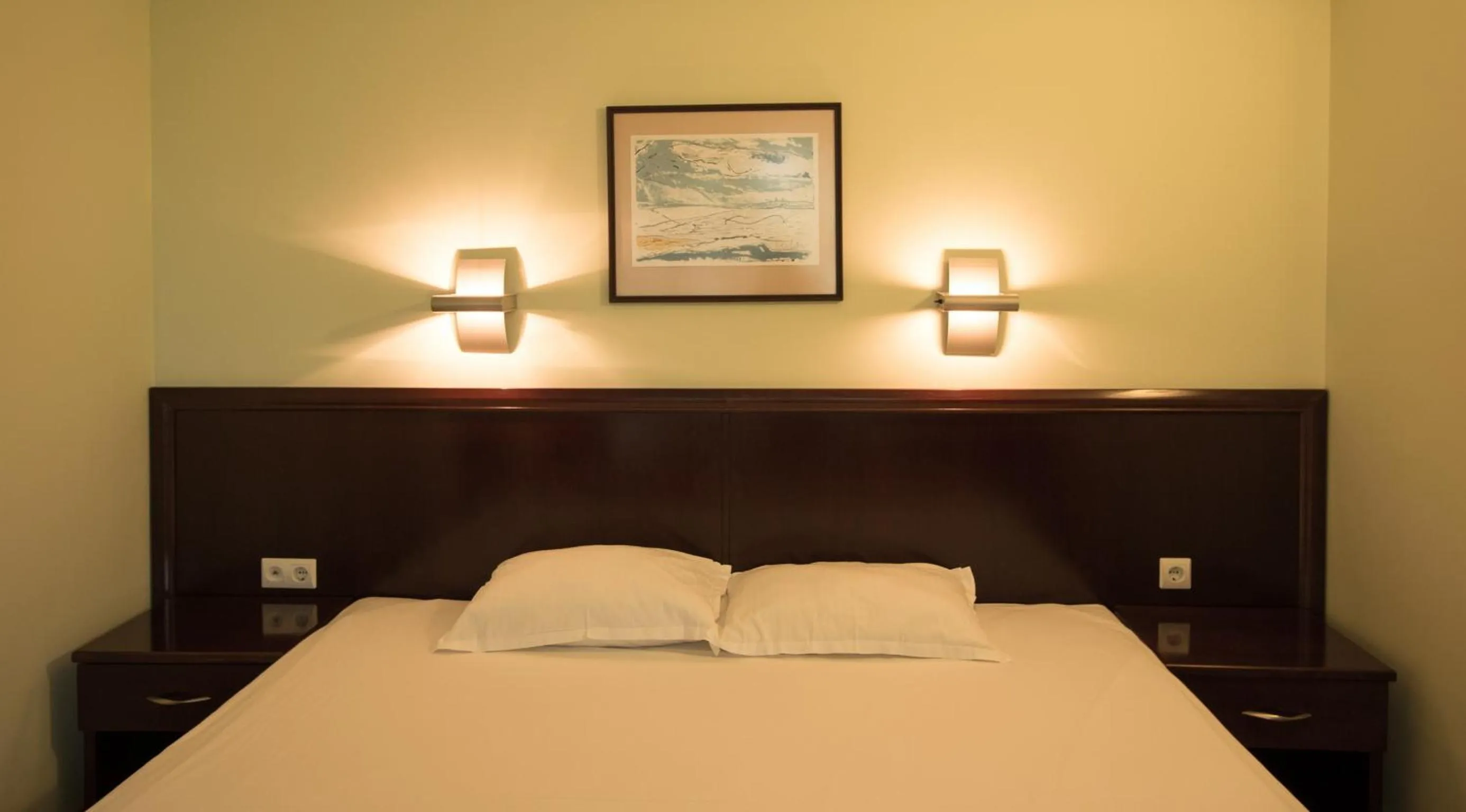 Bedroom, Bed in Hotel Divesta - self check in