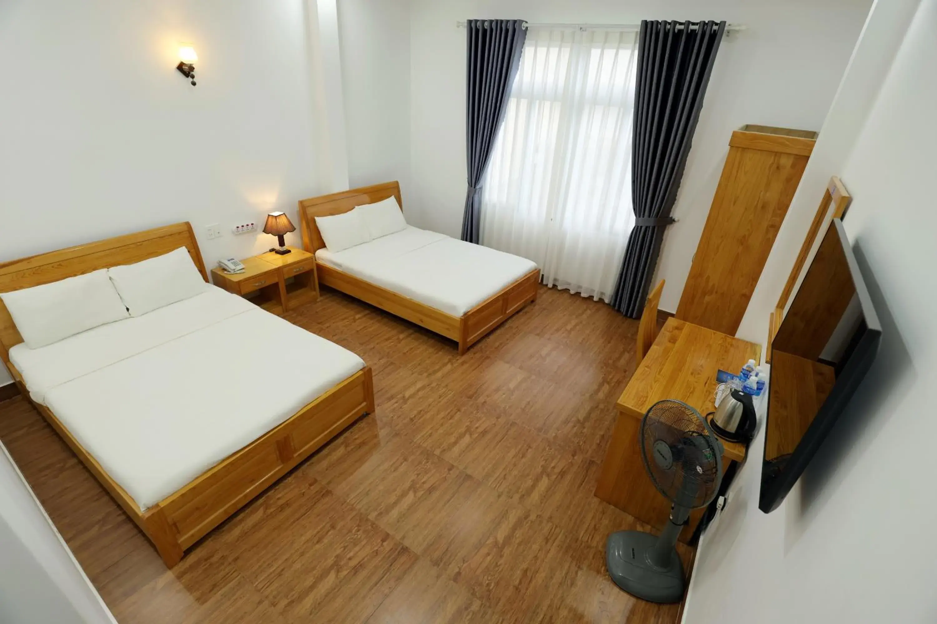 Deluxe Quadruple Room in Maxim Hotel Deluxe Quadruple Room in Maxim Hotel