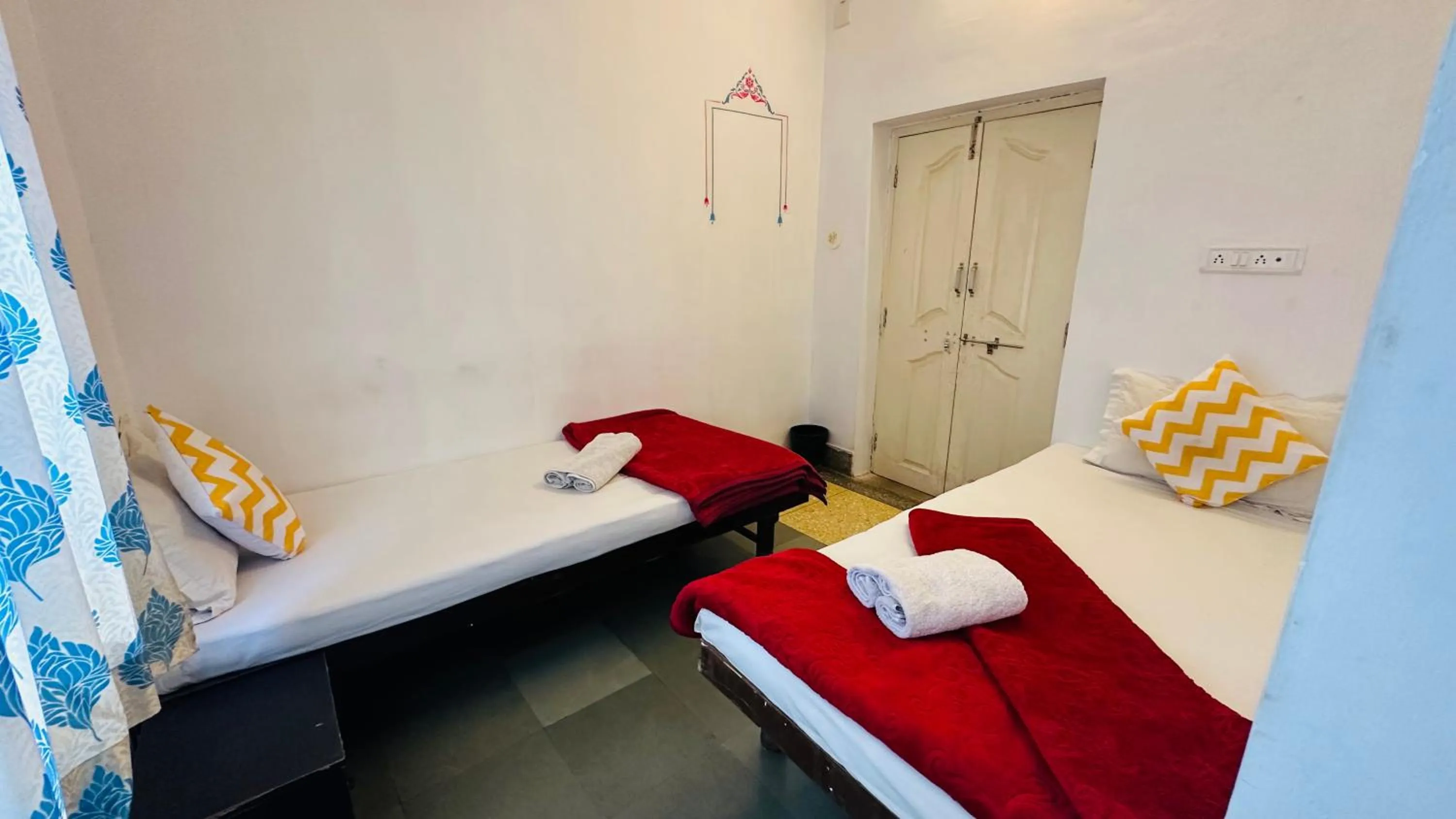 Bed in Maa Ji House on Lake Pichola