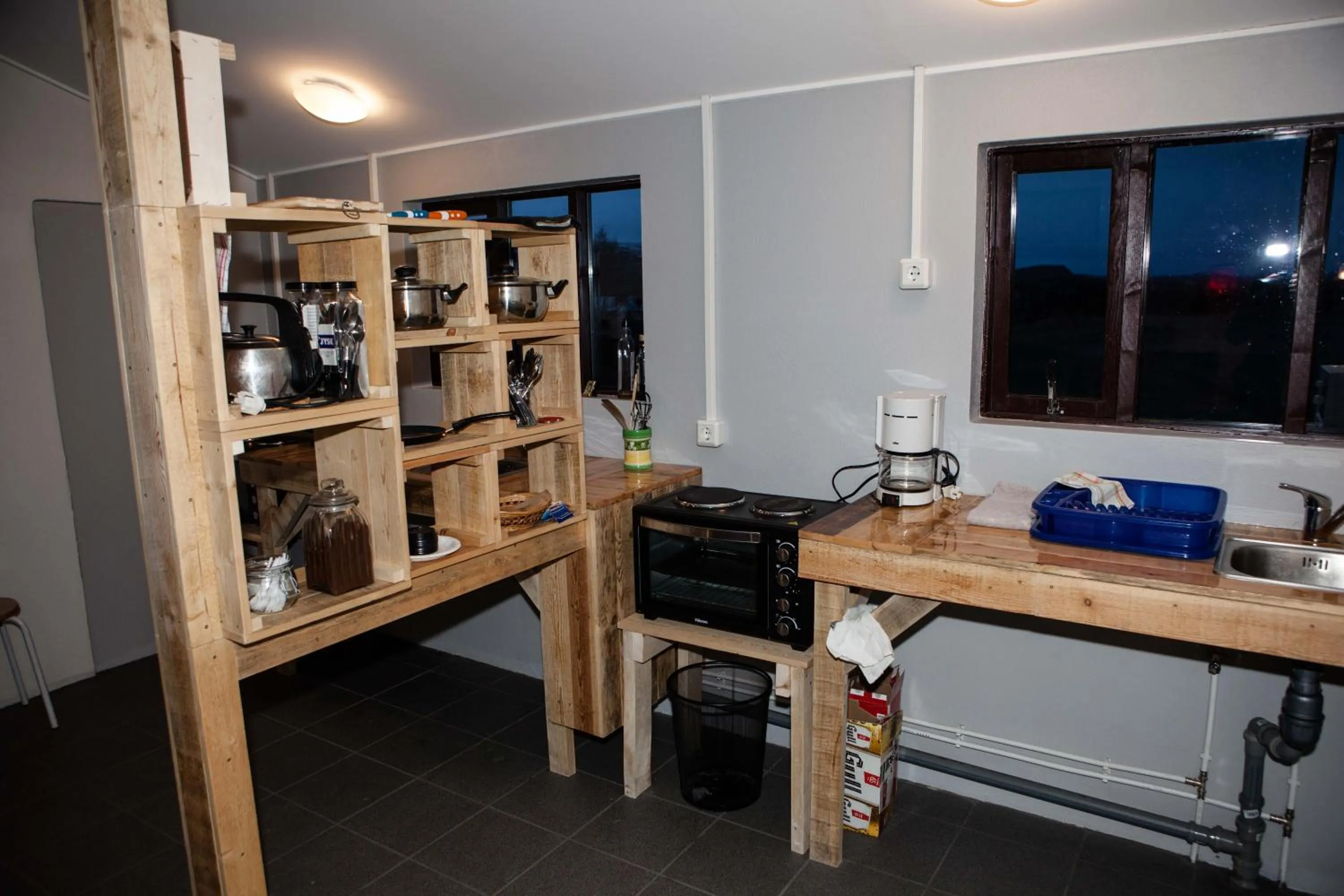 Communal kitchen in Mjóanes accommodation