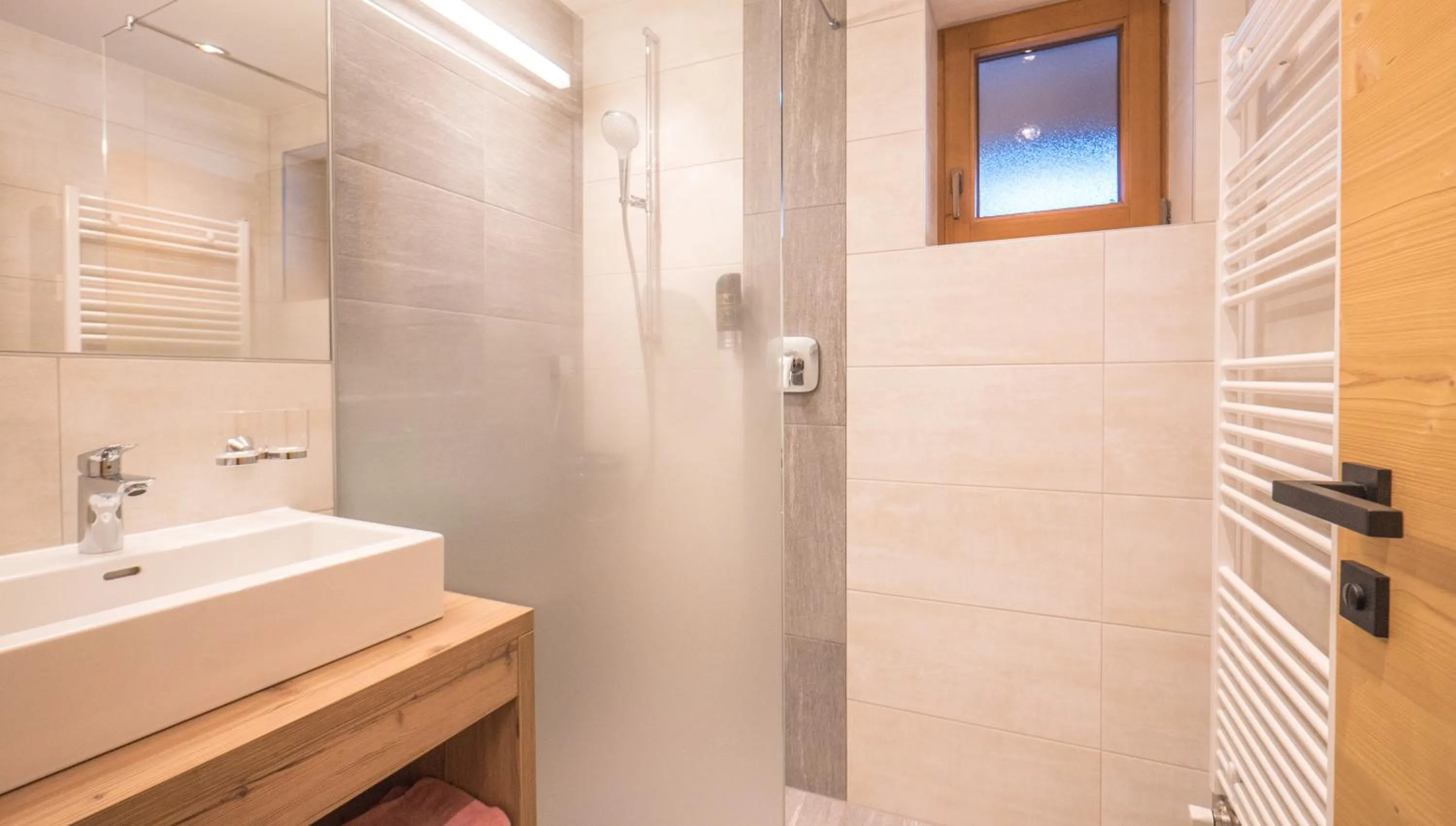 Bathroom in Hotel & Apart Central