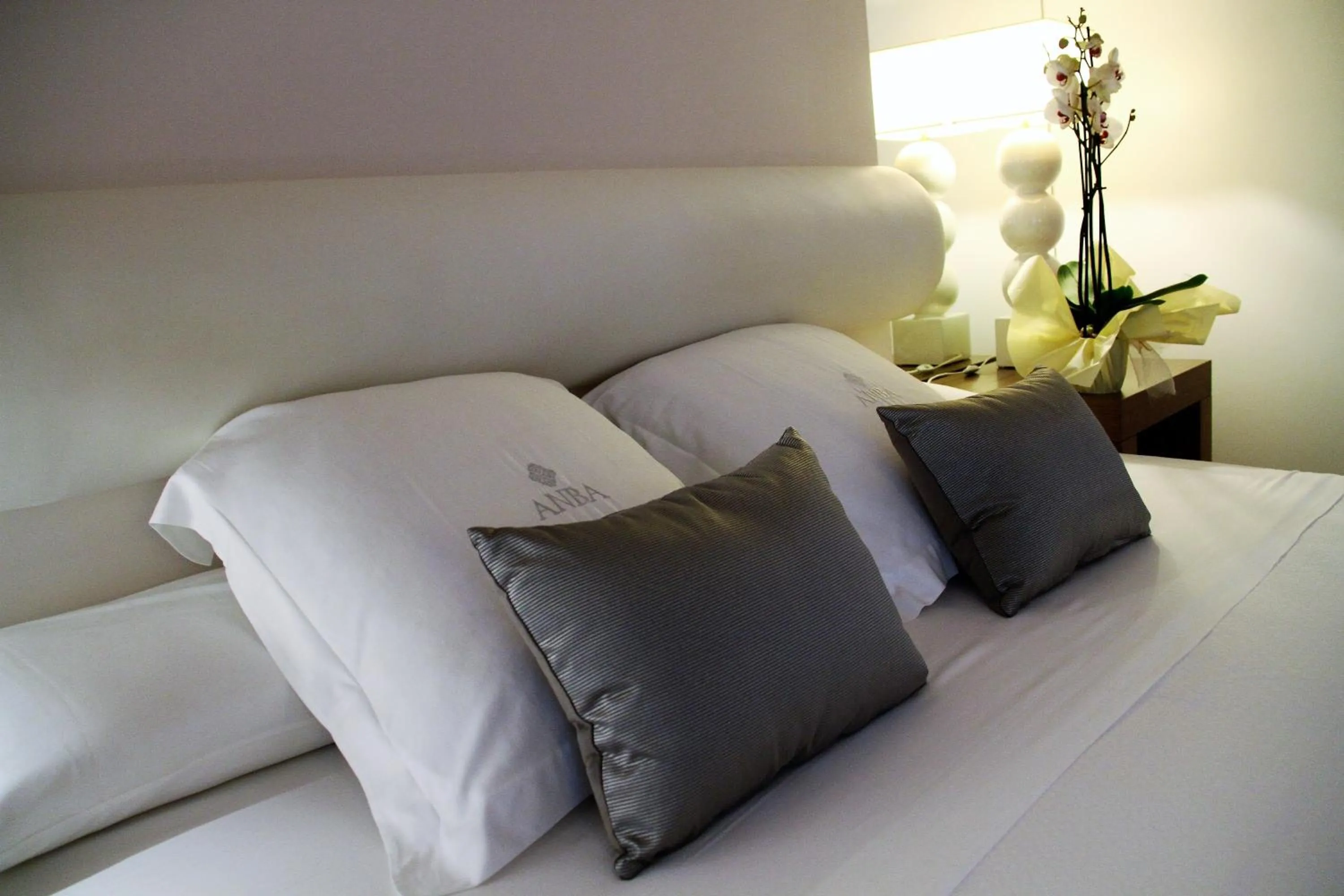 Bed, Seating Area in Anba Boutique