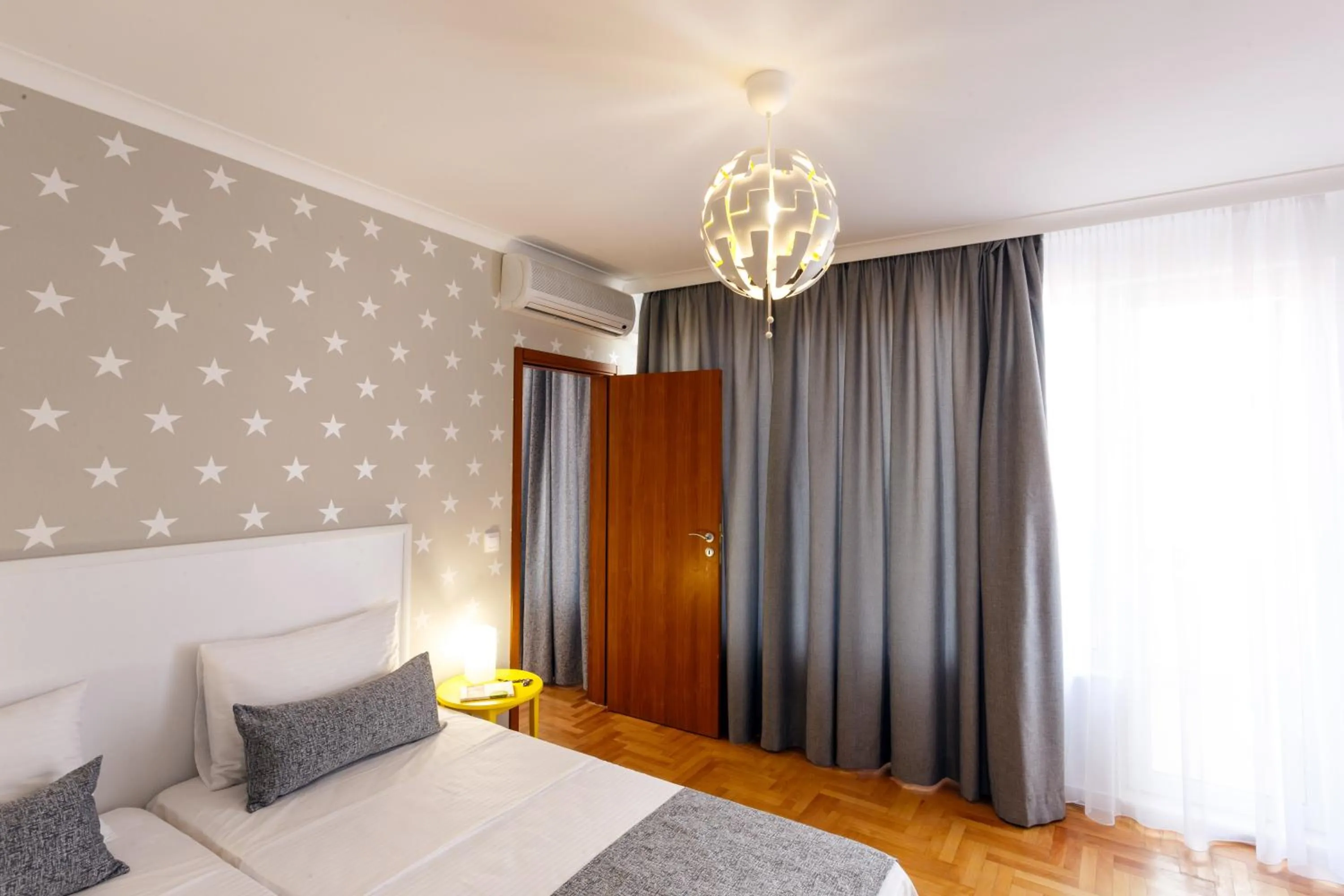 Bed in CityResidence Aparthotel