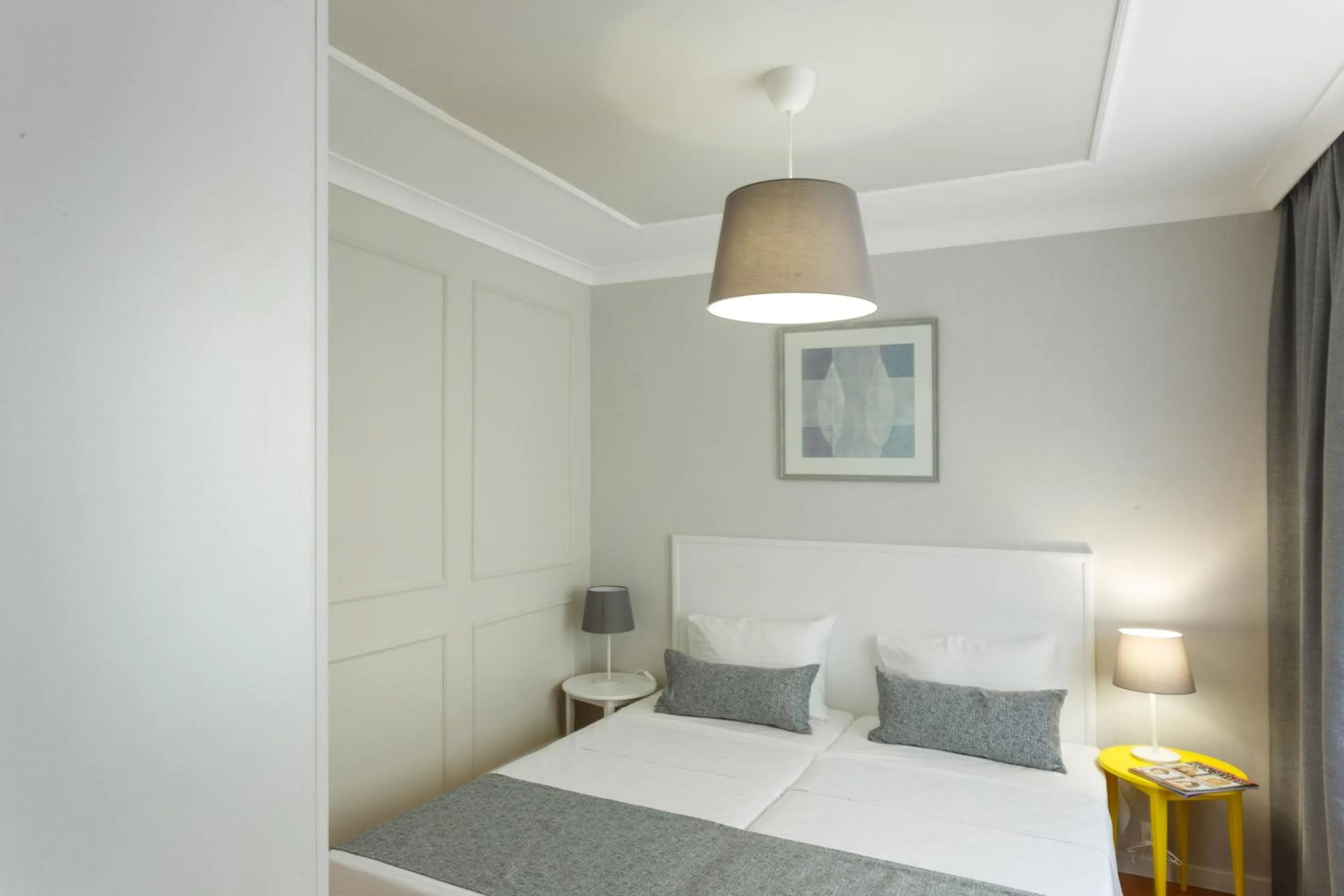 Bed in CityResidence Aparthotel