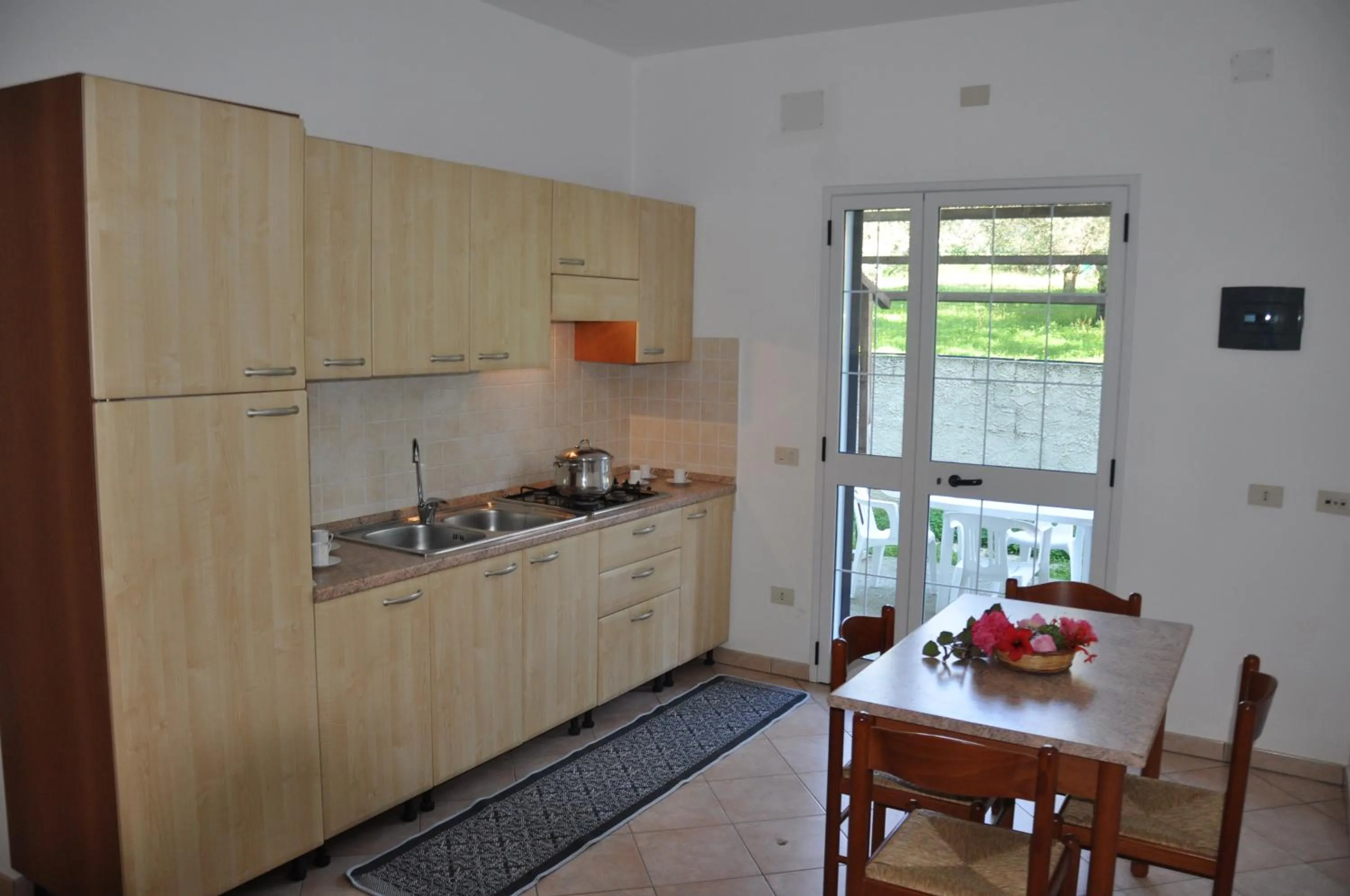 Kitchen or kitchenette in Rosy Hotel Residence