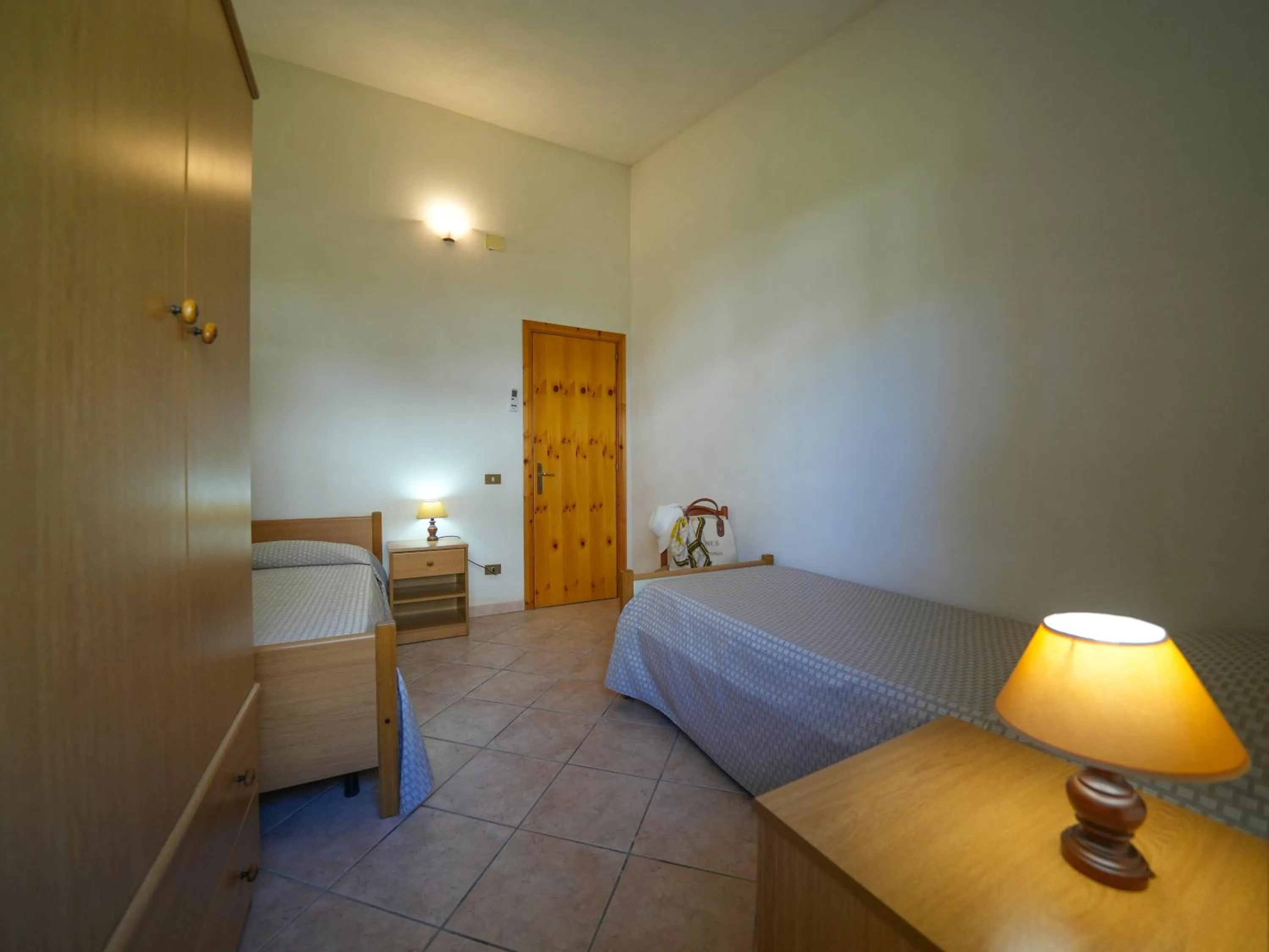 Photo of the whole room, Bed in Rosy Hotel Residence