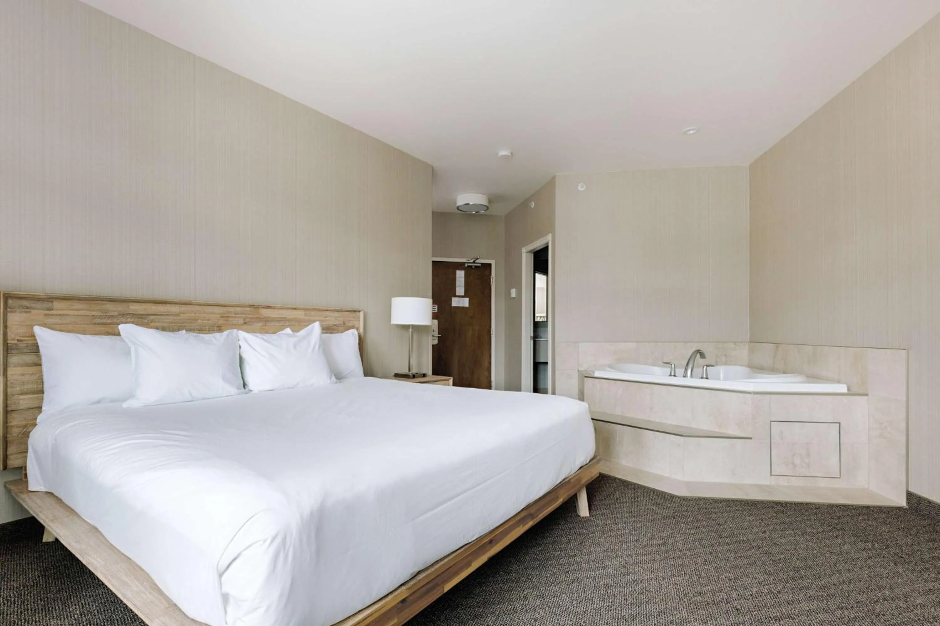 Bed in Balcomo, a Ramada by Wyndham