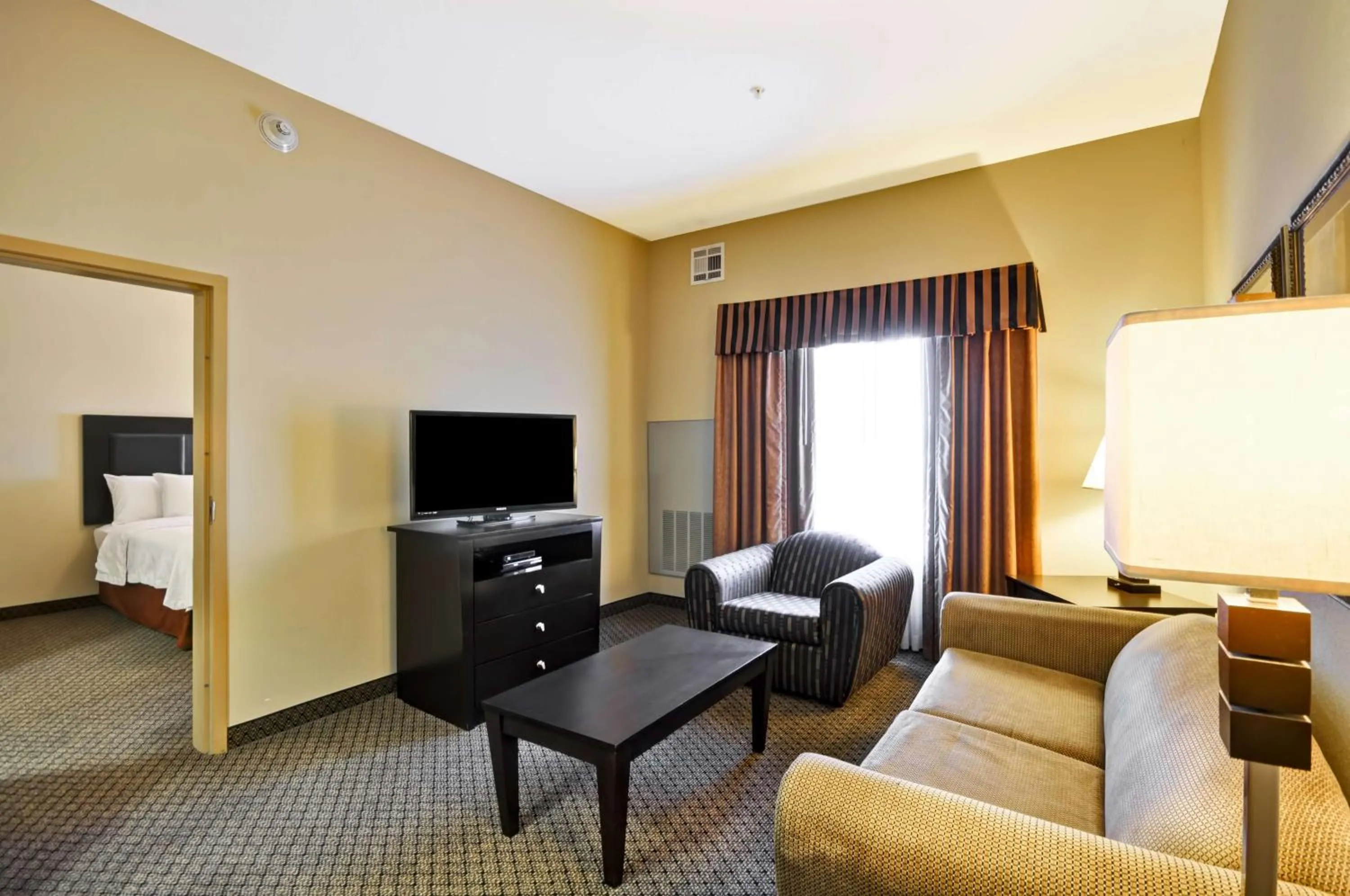 Living room in Homewood Suites by Hilton Tulsa-South
