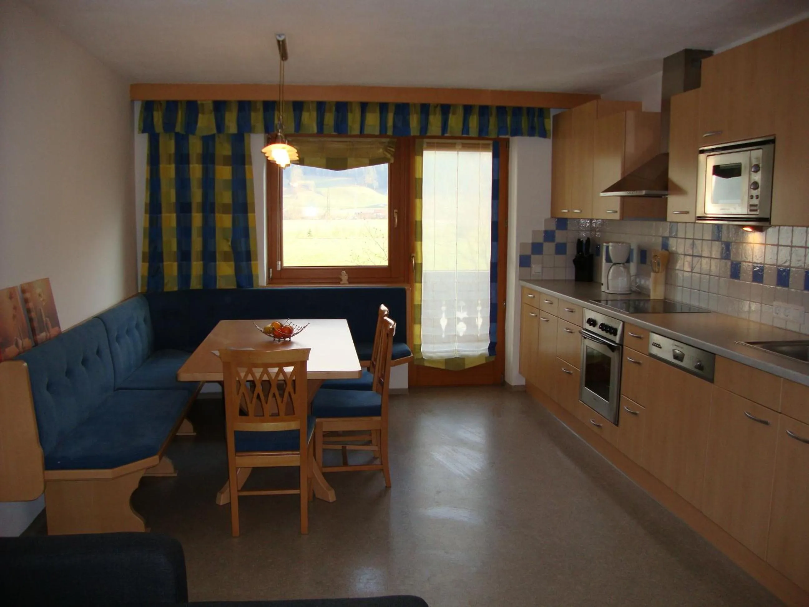 Kitchen or kitchenette in Gästehaus Schwoagerhof