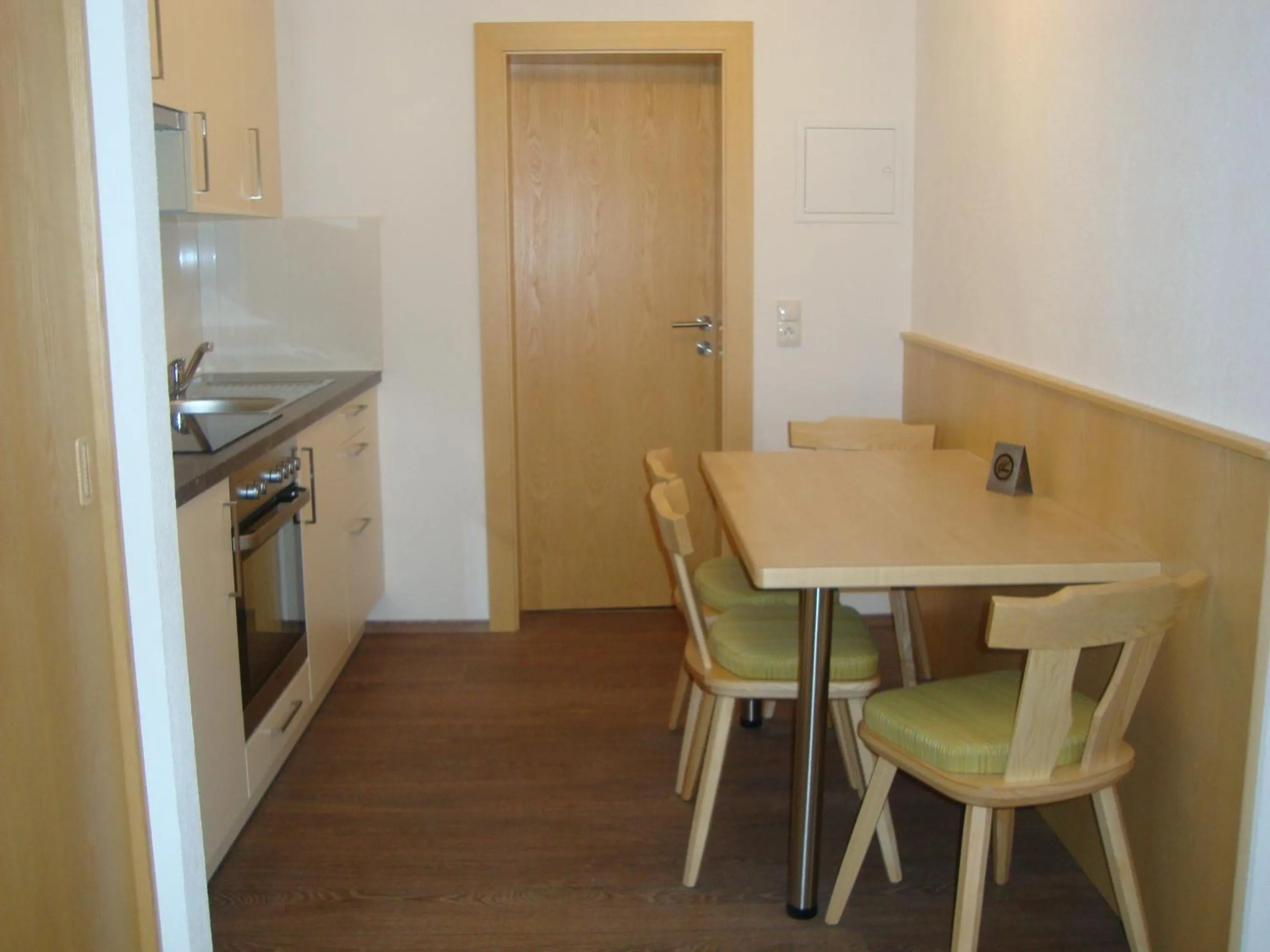 Kitchen or kitchenette in Gästehaus Schwoagerhof