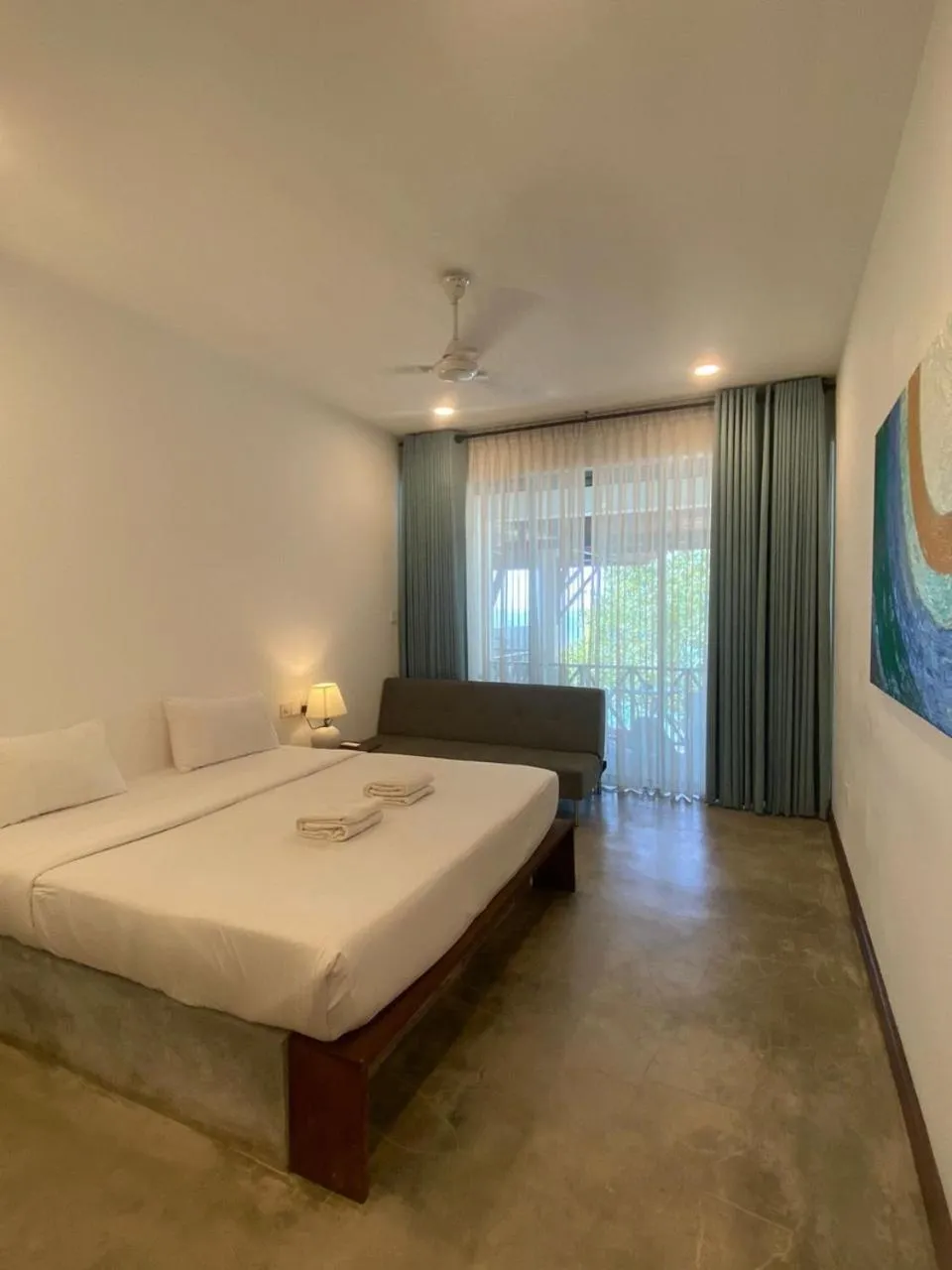 Bed in Sun N Sea Hotel