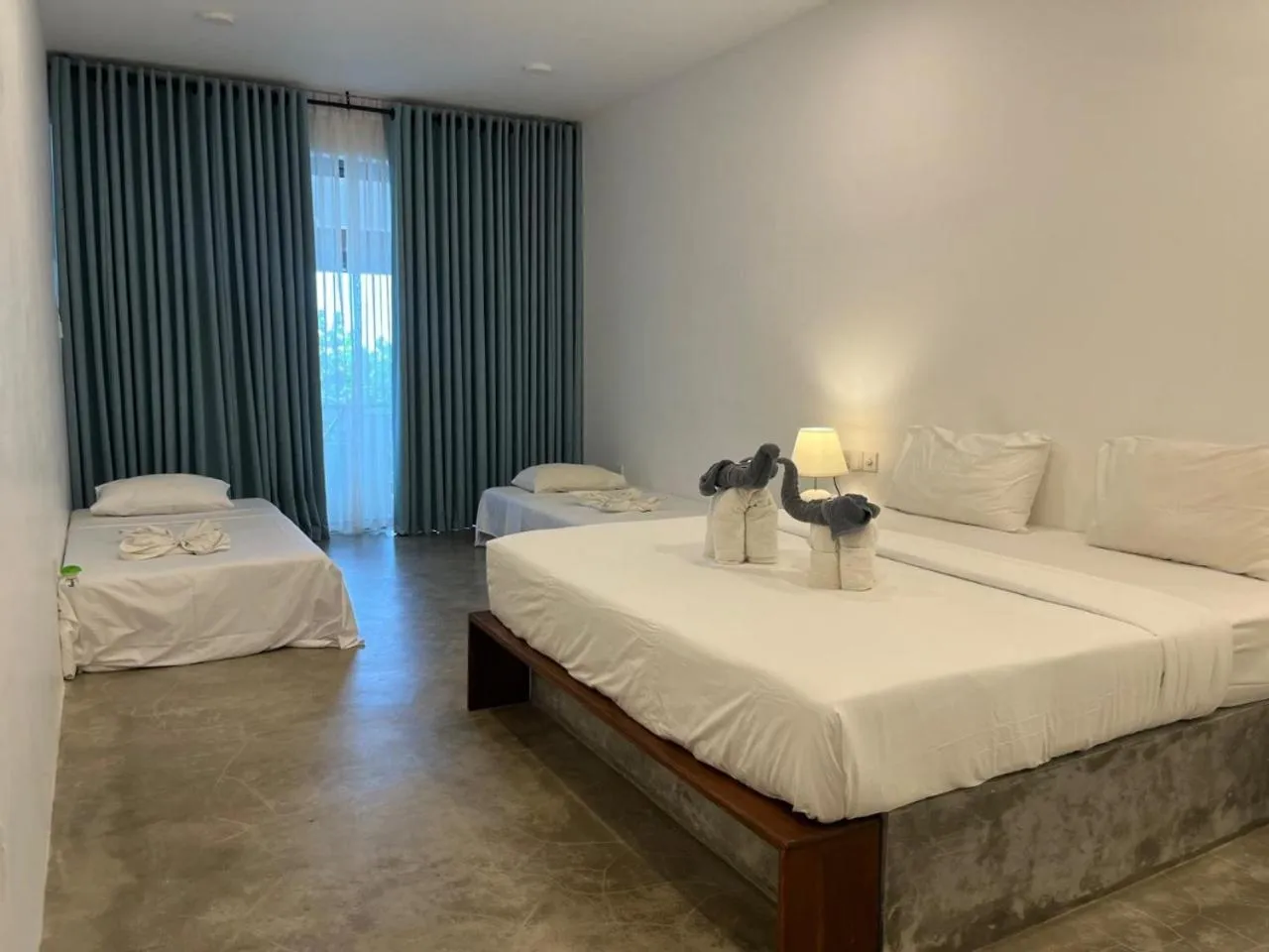 Bed in Sun N Sea Hotel