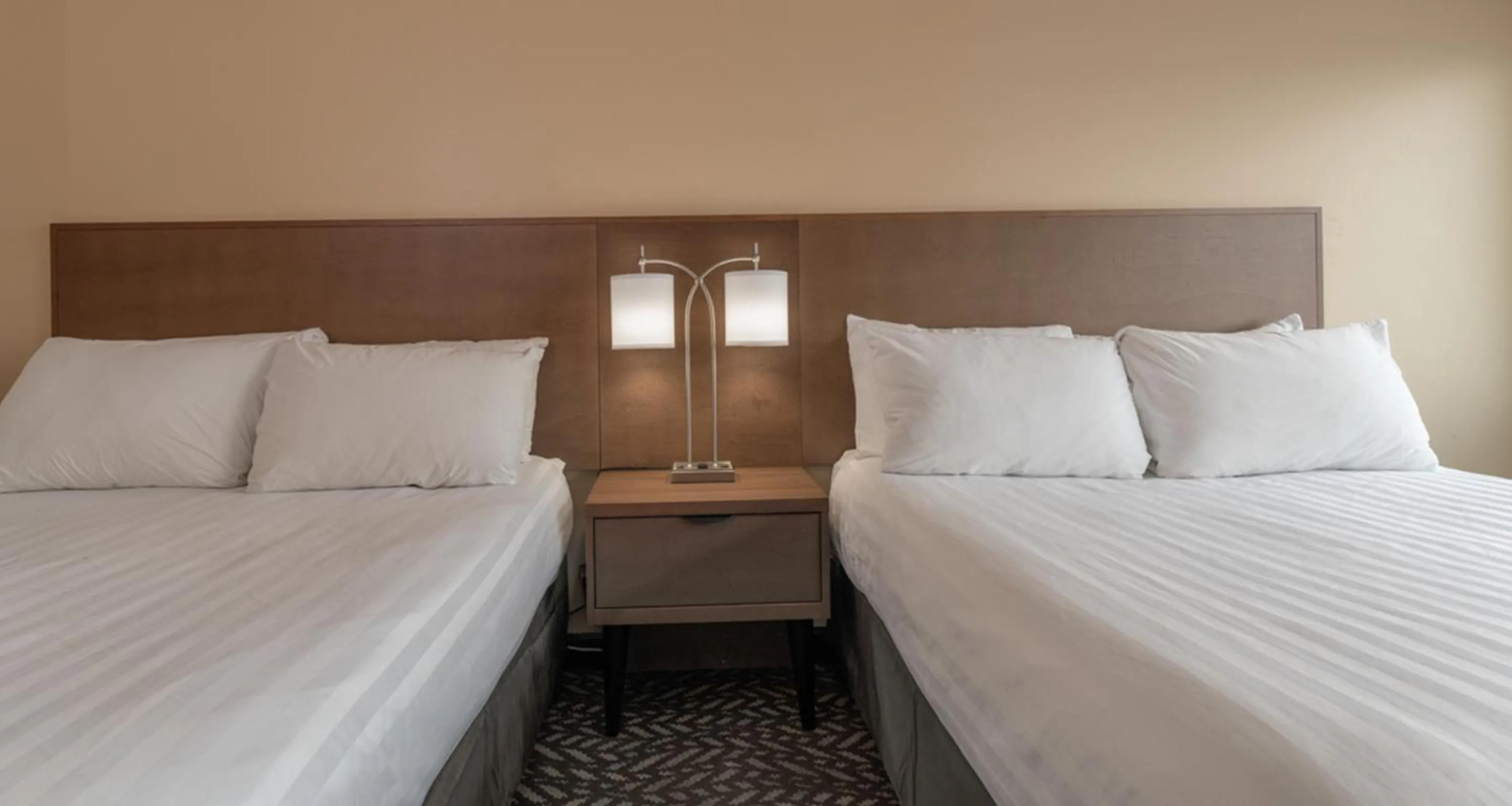 Bed in Prestige Oceanview Hotel Prince Rupert