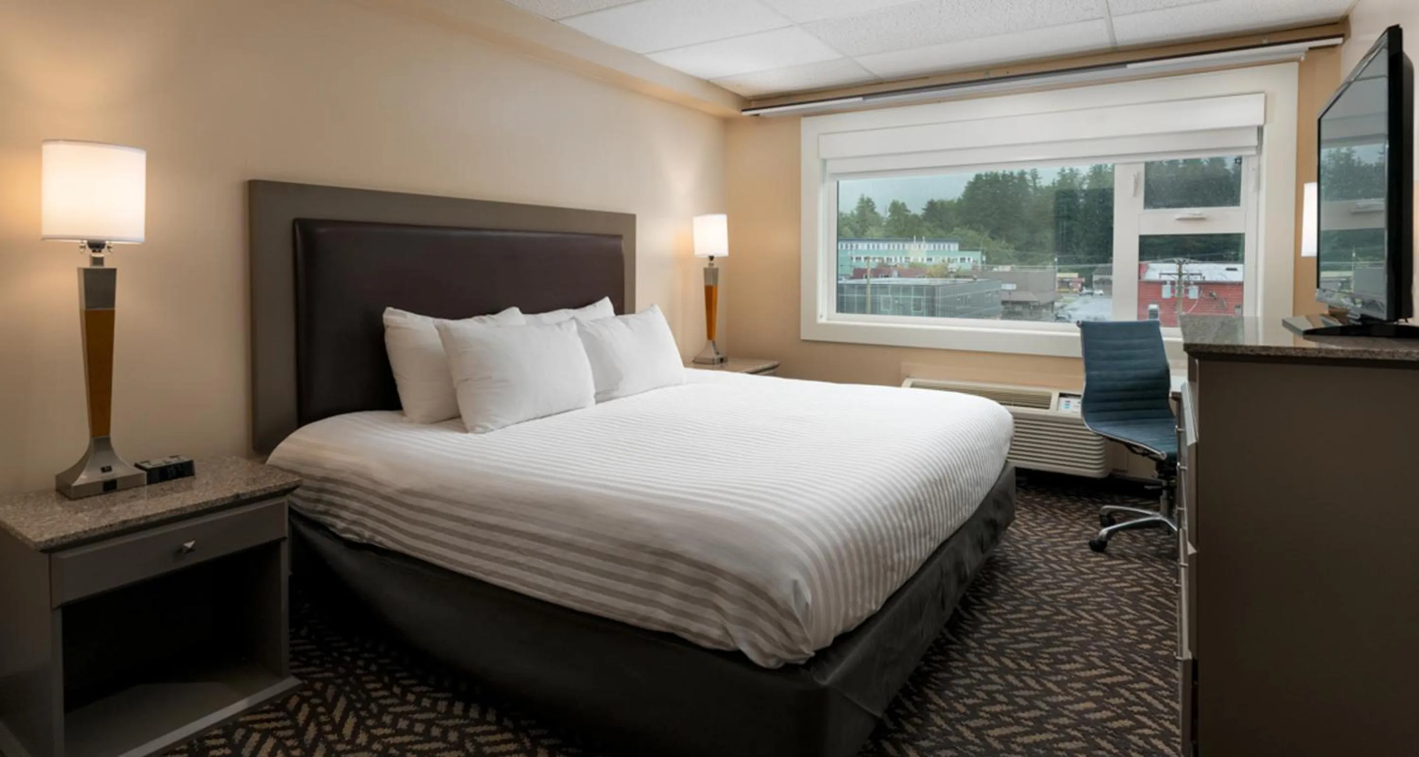 Bed in Prestige Oceanview Hotel Prince Rupert