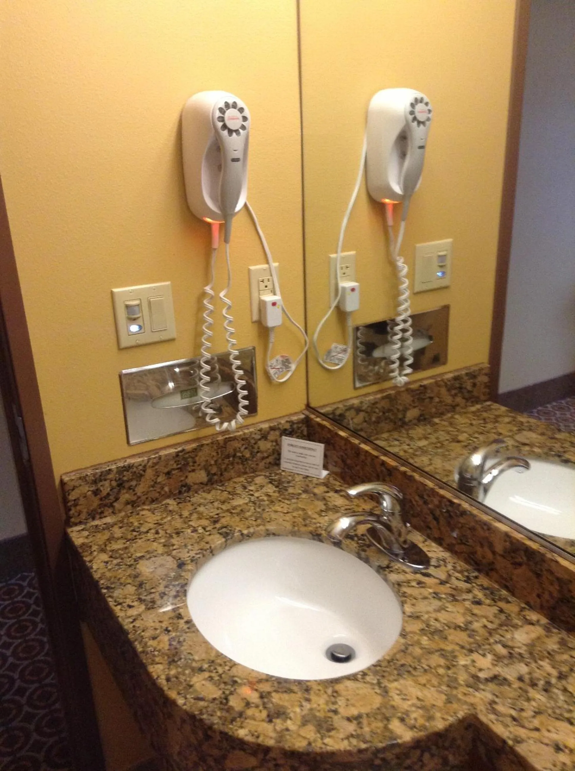 Bathroom in Microtel by Wyndham South Bend Notre Dame University