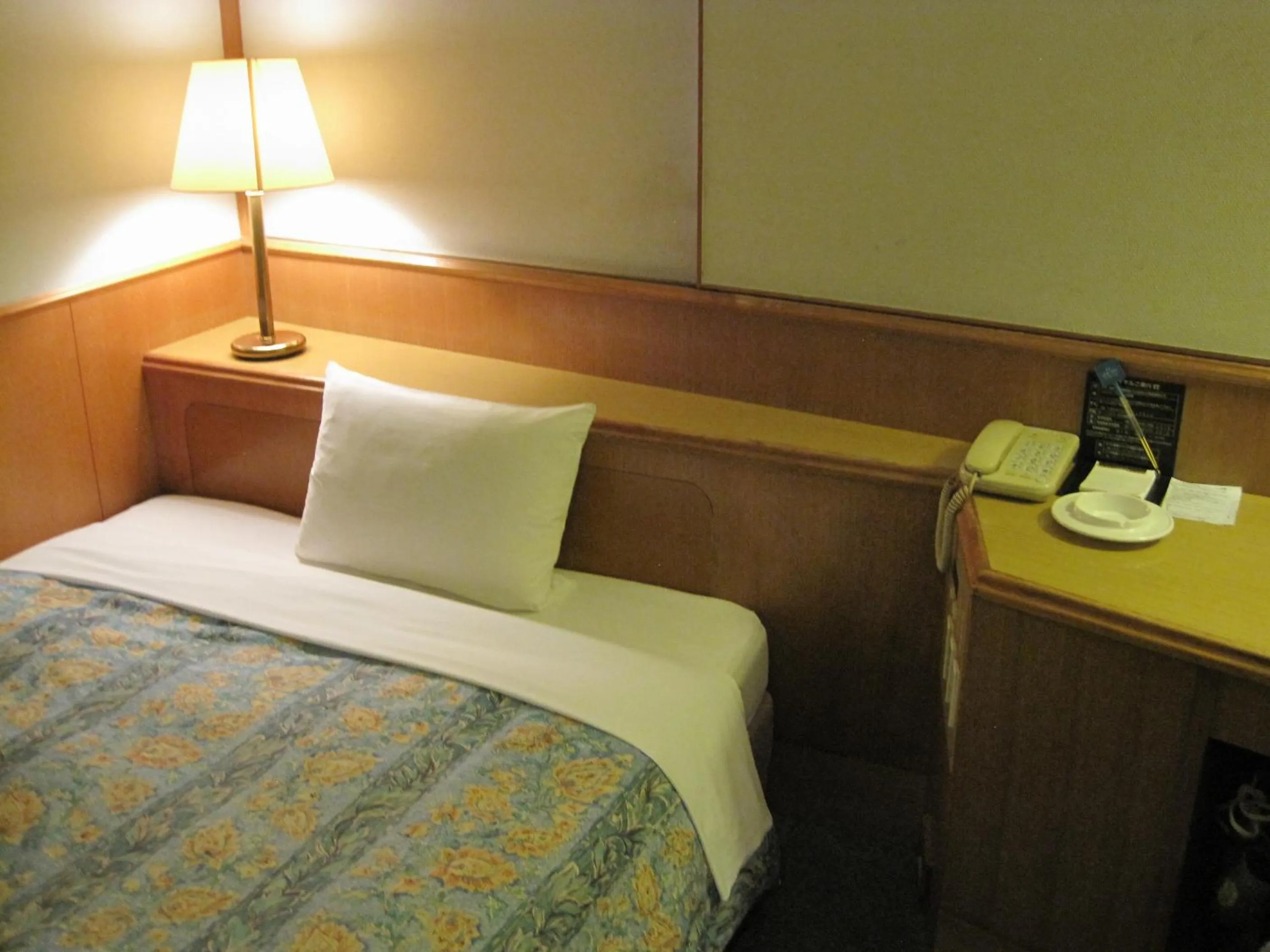 Bed in Hyuga Dai-ichi Hotel