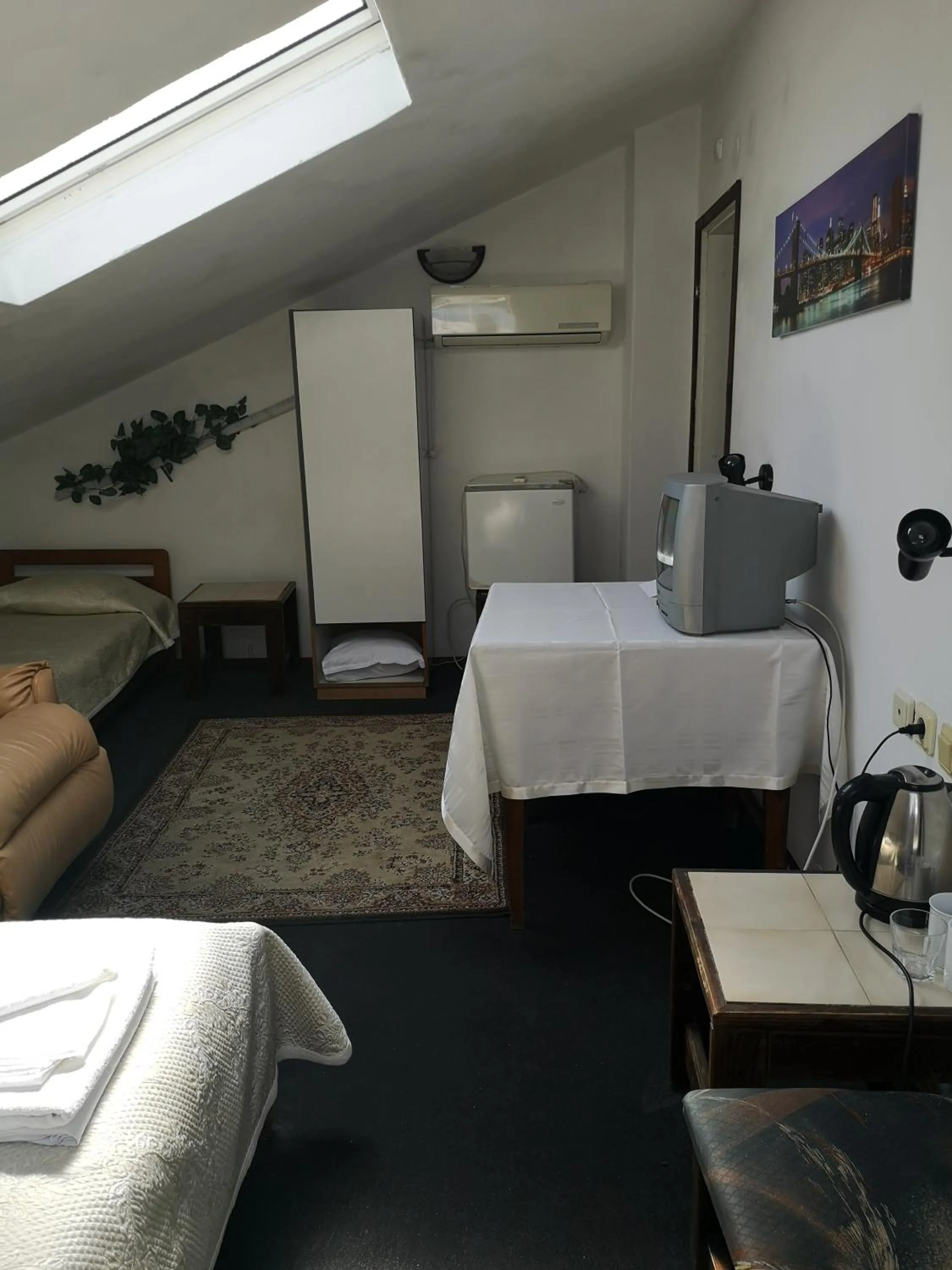 Bed in Family Hotel Verona