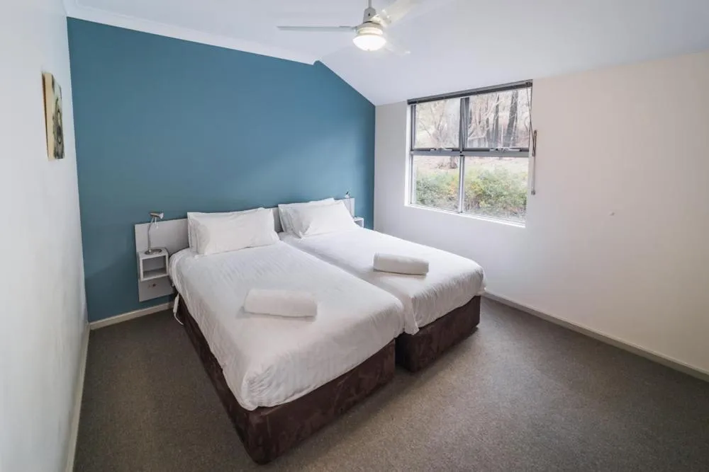 Bed in Cosy Corner Sea View Apartments