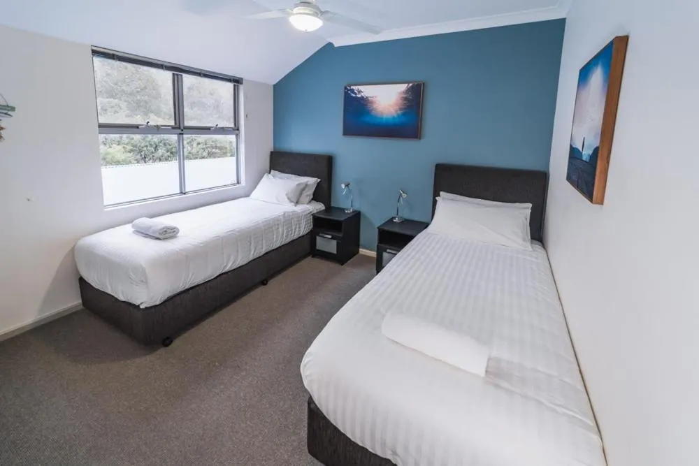 Bed in Cosy Corner Sea View Apartments