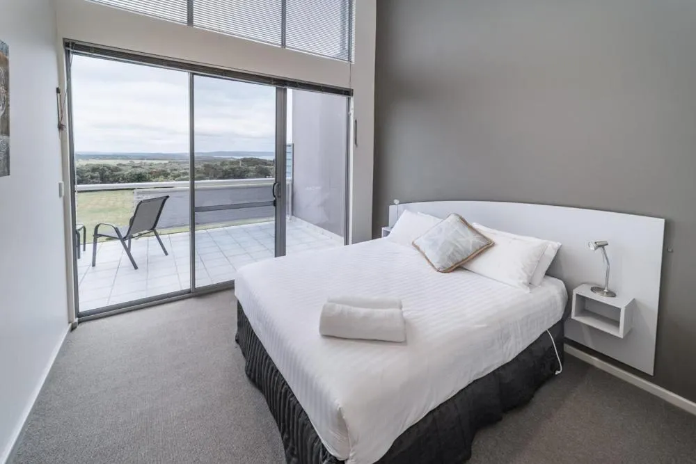 Bed in Cosy Corner Sea View Apartments