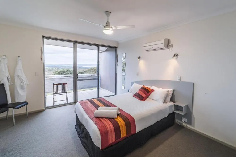 Bed in Cosy Corner Sea View Apartments