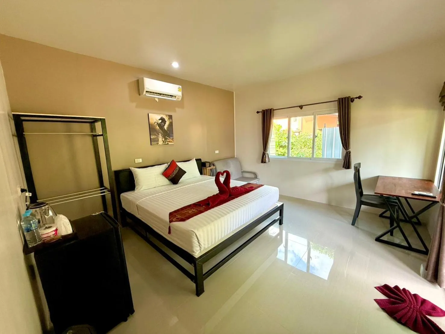 Bed in Lanta Palm Beach Resort , Beach Bungalow - Koh Lanta