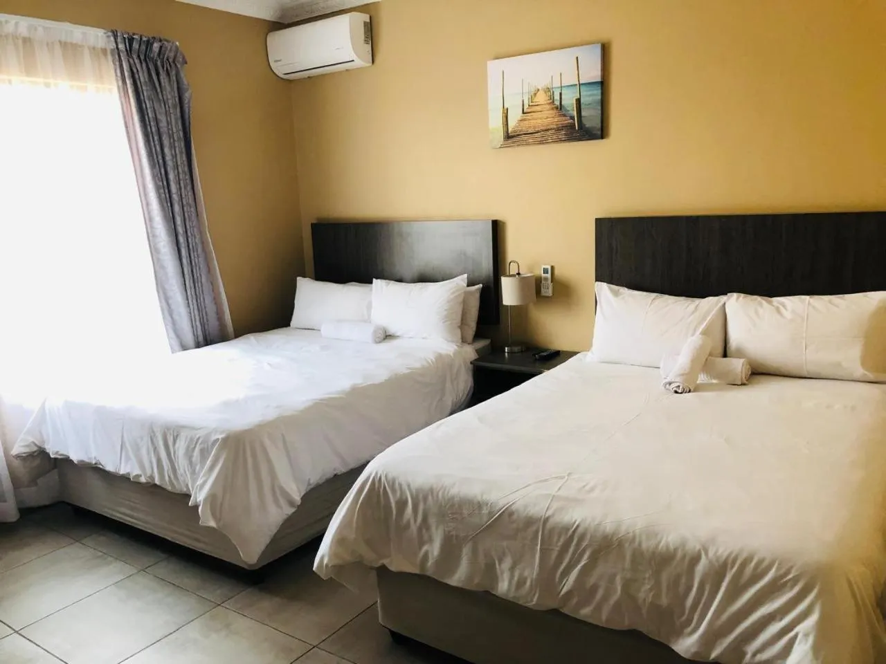 Bed in La Bronze Guest Lodge