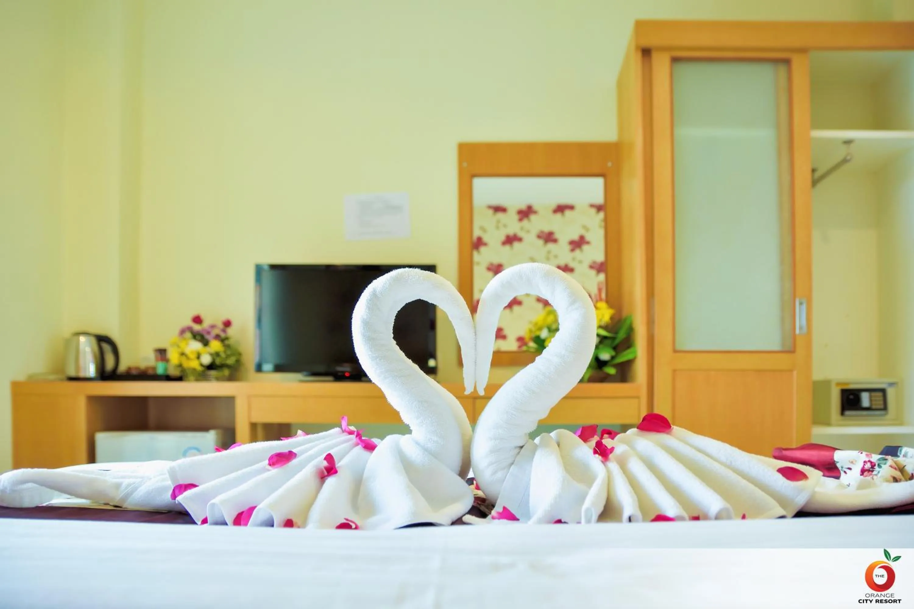 Bed in The Orange City Resort