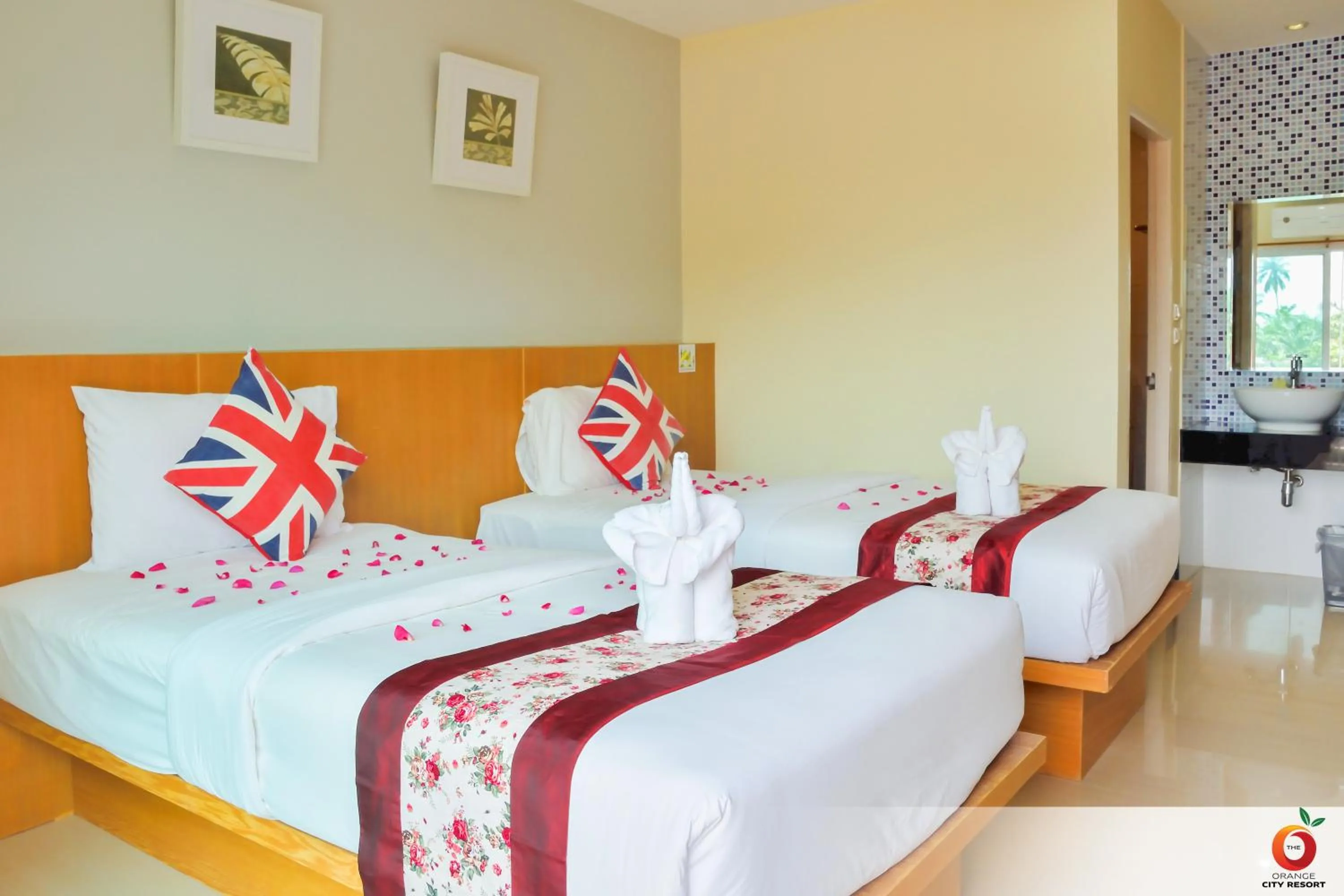 Bed in The Orange City Resort