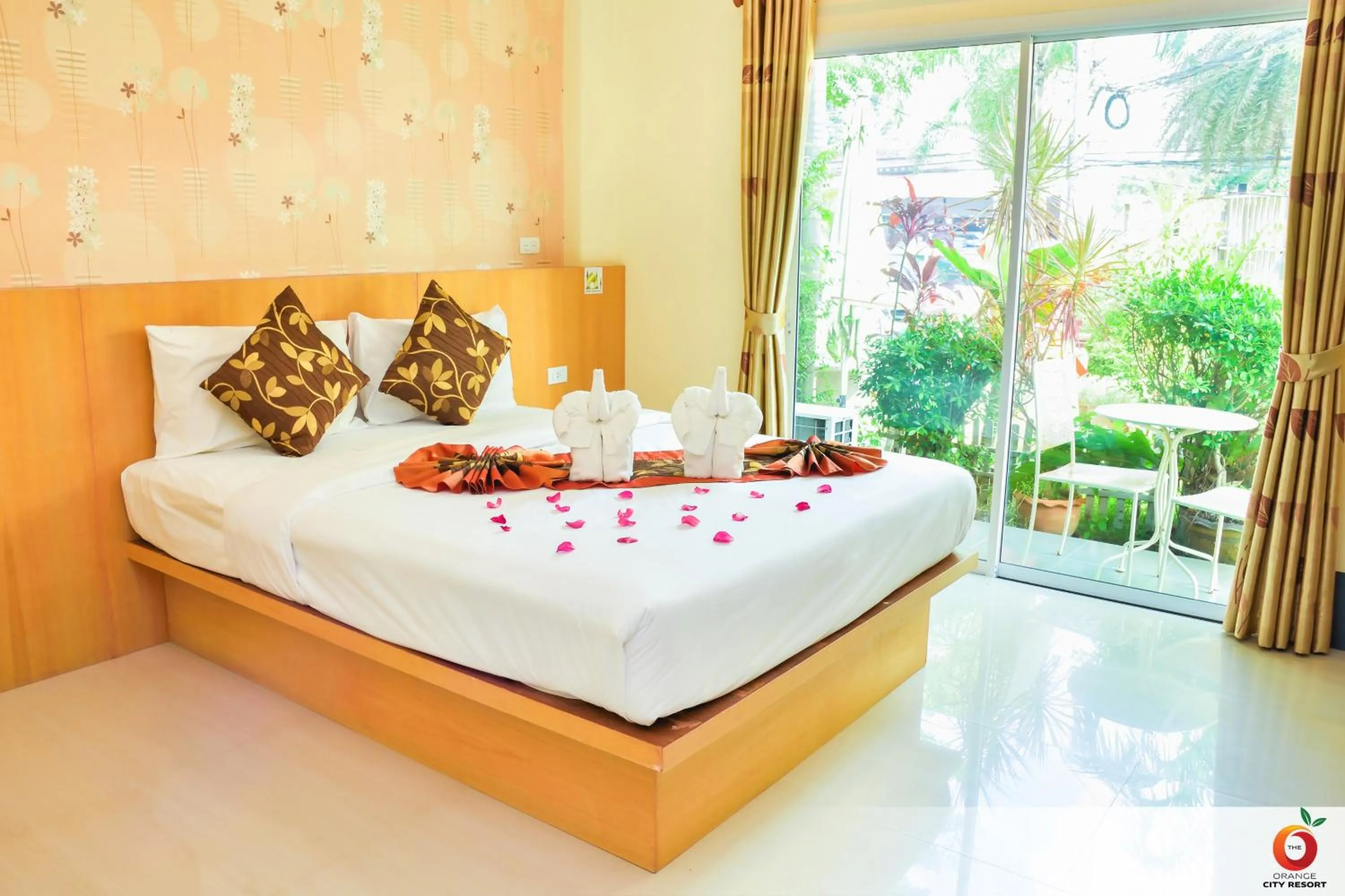 Bed in The Orange City Resort