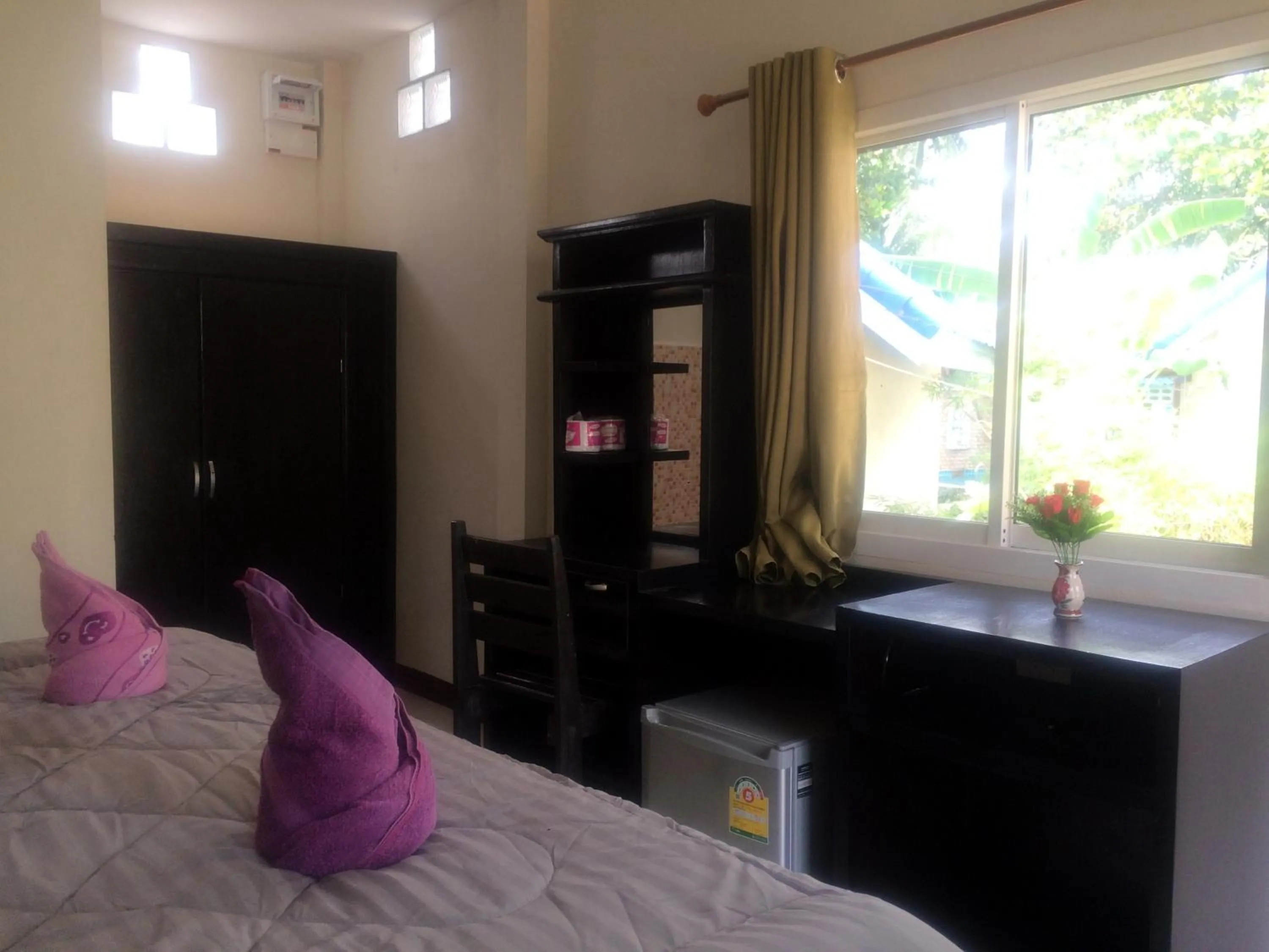 Bed in Sea Shell Beach Resort