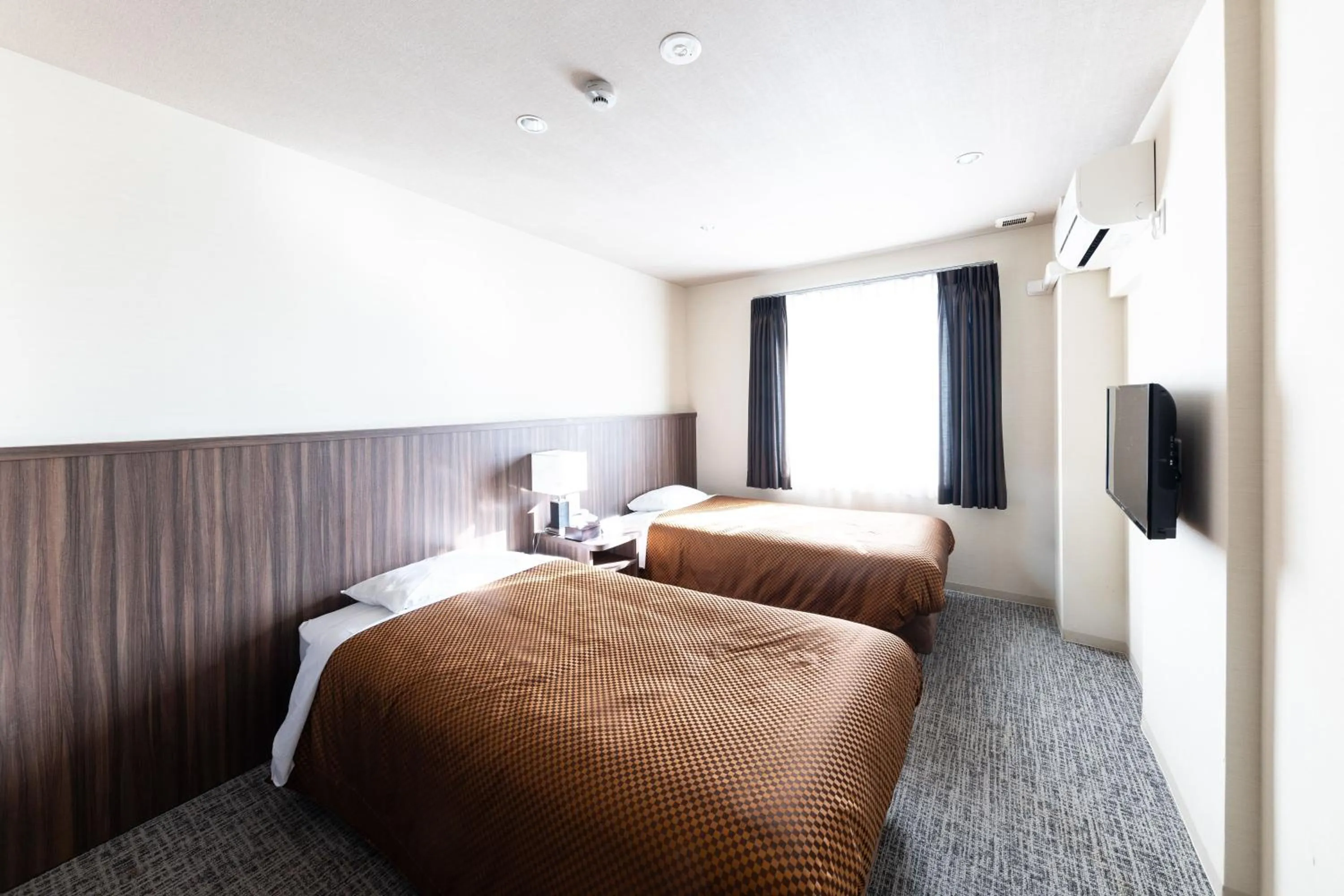 Bed in Reco Hotel Mikuni