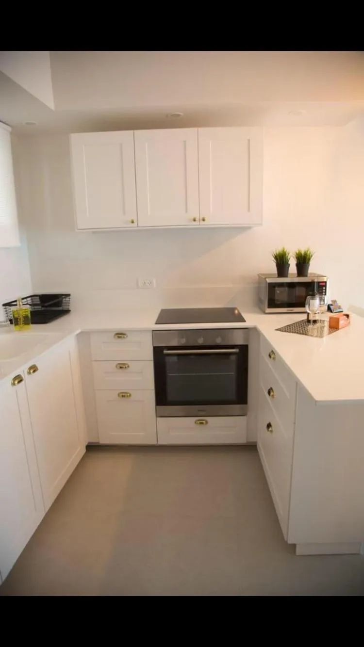 Kitchen or kitchenette in Suite Caesar - Neot Golf