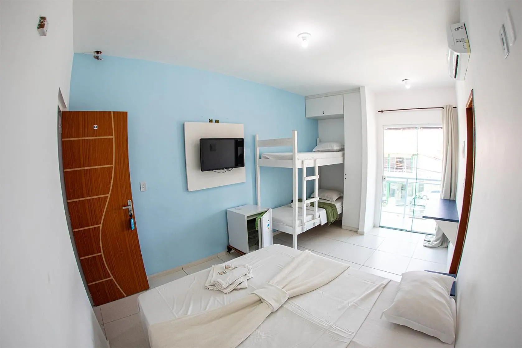 Bed in Xodó do Peró Suítes