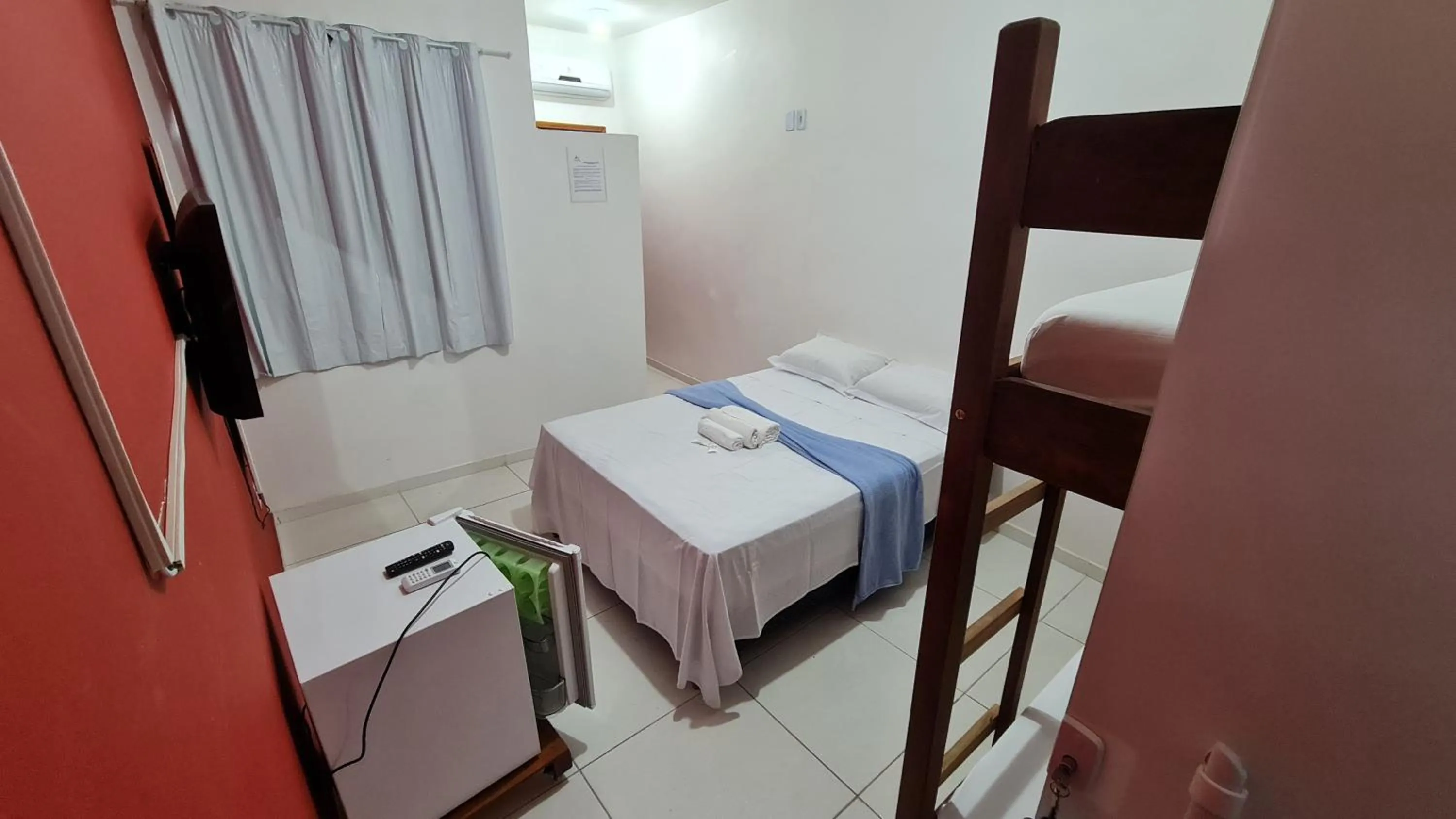 Bed in Xodó do Peró Suítes