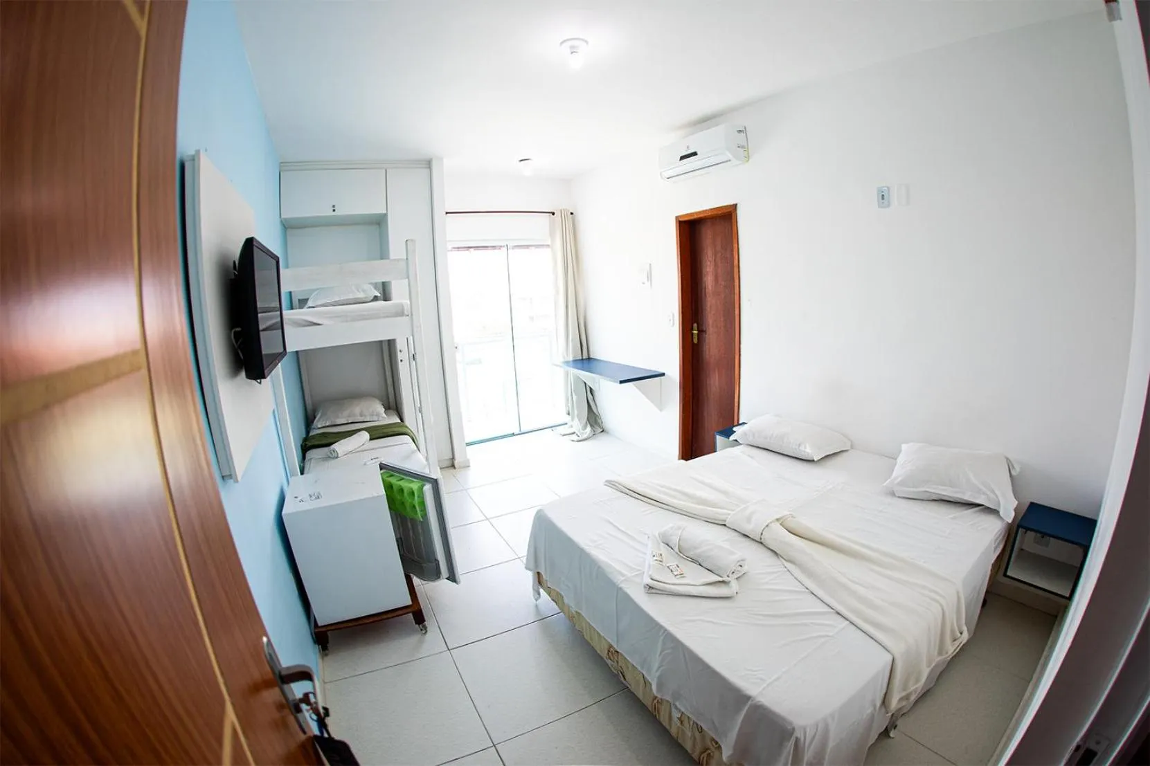 Bed in Xodó do Peró Suítes