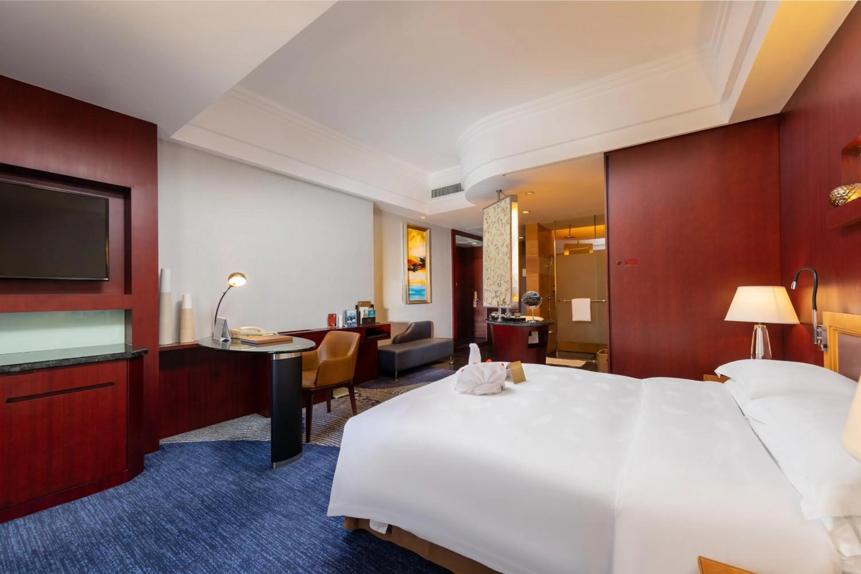 Bed in Zhuhai Charming Holiday Hotel